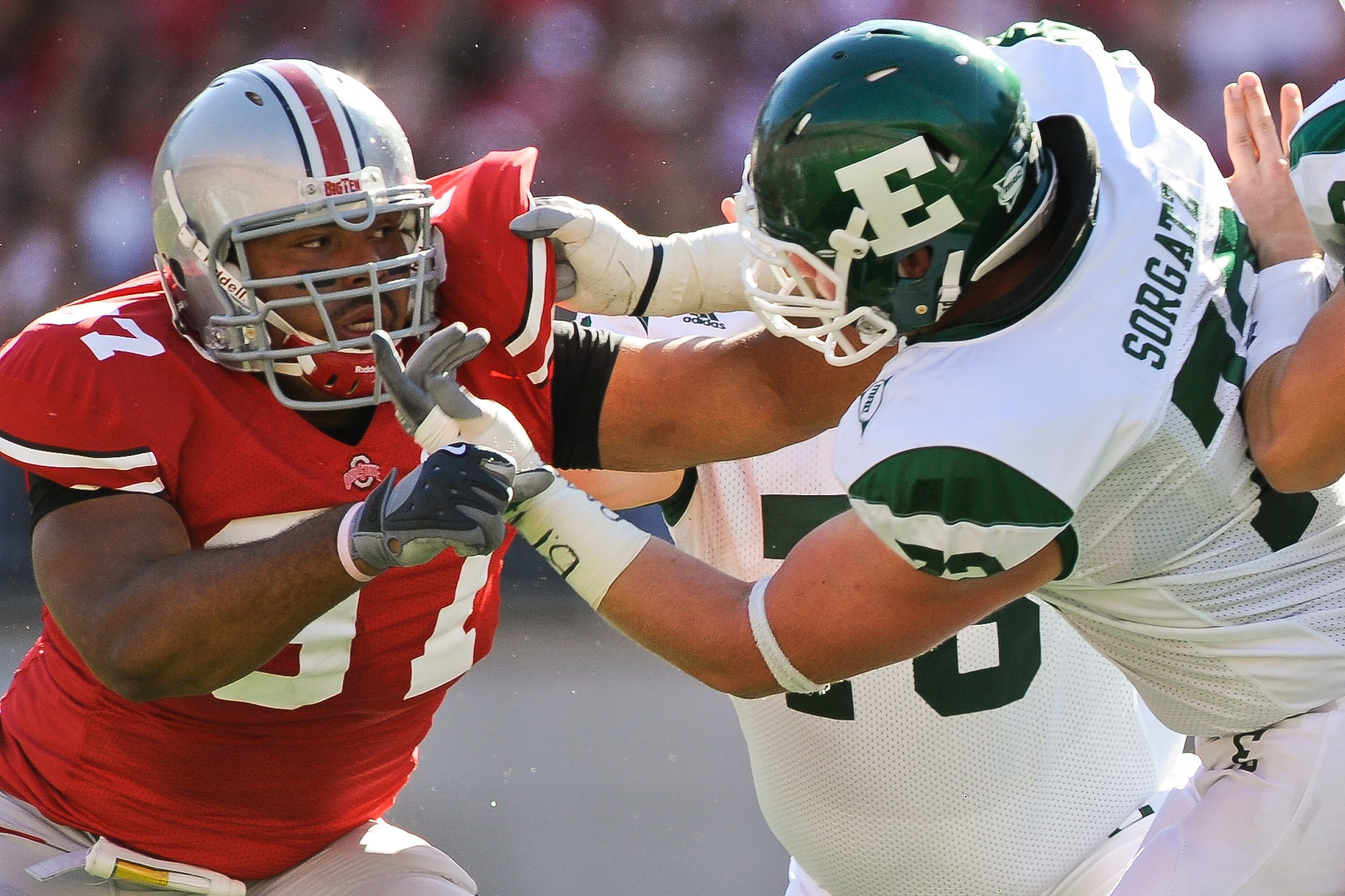 COLUMBUS, OH - SEPTEMBER 25:  Cameron Heyward #97 of the Ohio State Buckeyes fights through a block by Andrew Sorgatz #72 of the Eastern Michigan Eagles at Ohio Stadium on September 25, 2010 in Columbus, Ohio.  Ohio State won 73-20. (Photo by Jamie Sabau/