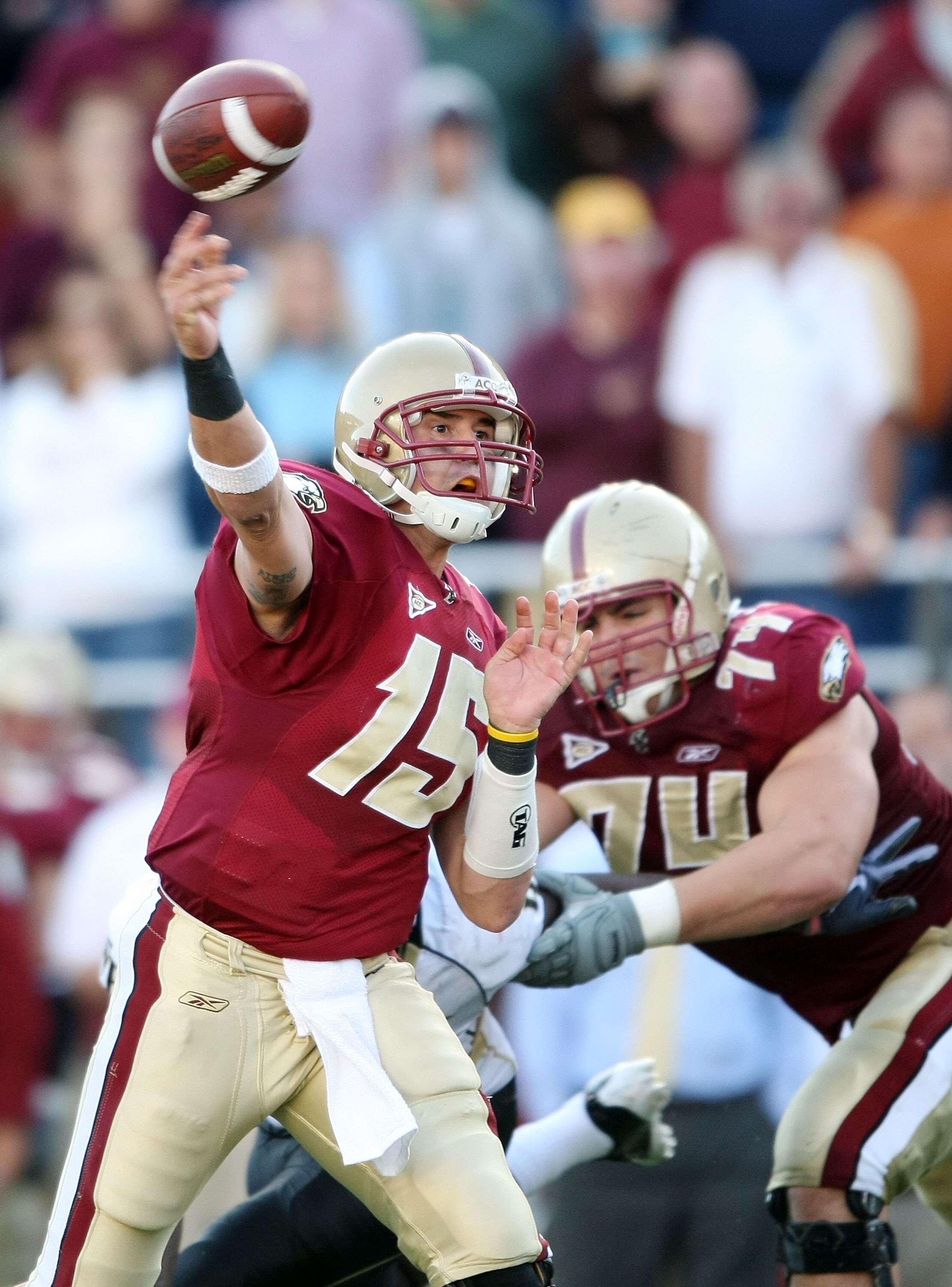 CHESTNUT HILL, MA - SEPTEMBER 26:  Dave Shinskie #15 of the Boston College Eagles passes the ball in overtime as teammate Anthony Castonzo #74 blocks against the Wake Forest Demon Deacons on September 26, 2009 at Alumni Stadium in Chestnut Hill, Massachus