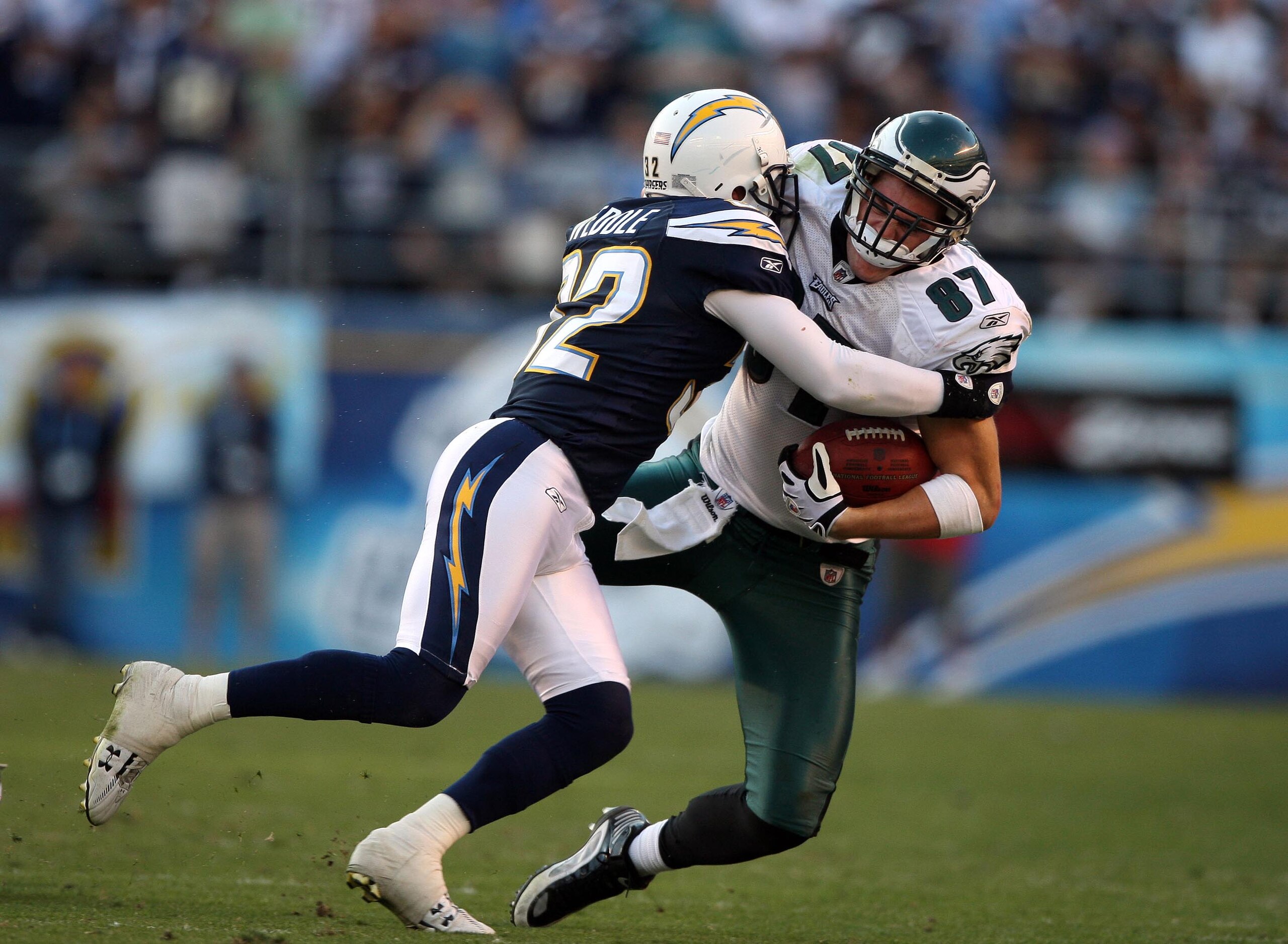 SAN DIEGO, CA - NOVEMBER 15:   Tight-End Brent Celek #87 of the Philadelphia Eagles is tackled after the catch by Eric Weddle #32 of the San Diego Chargers during the NFL football game on November 15, 2009 at Qualcomm Stadium in San Diego, California. Cha