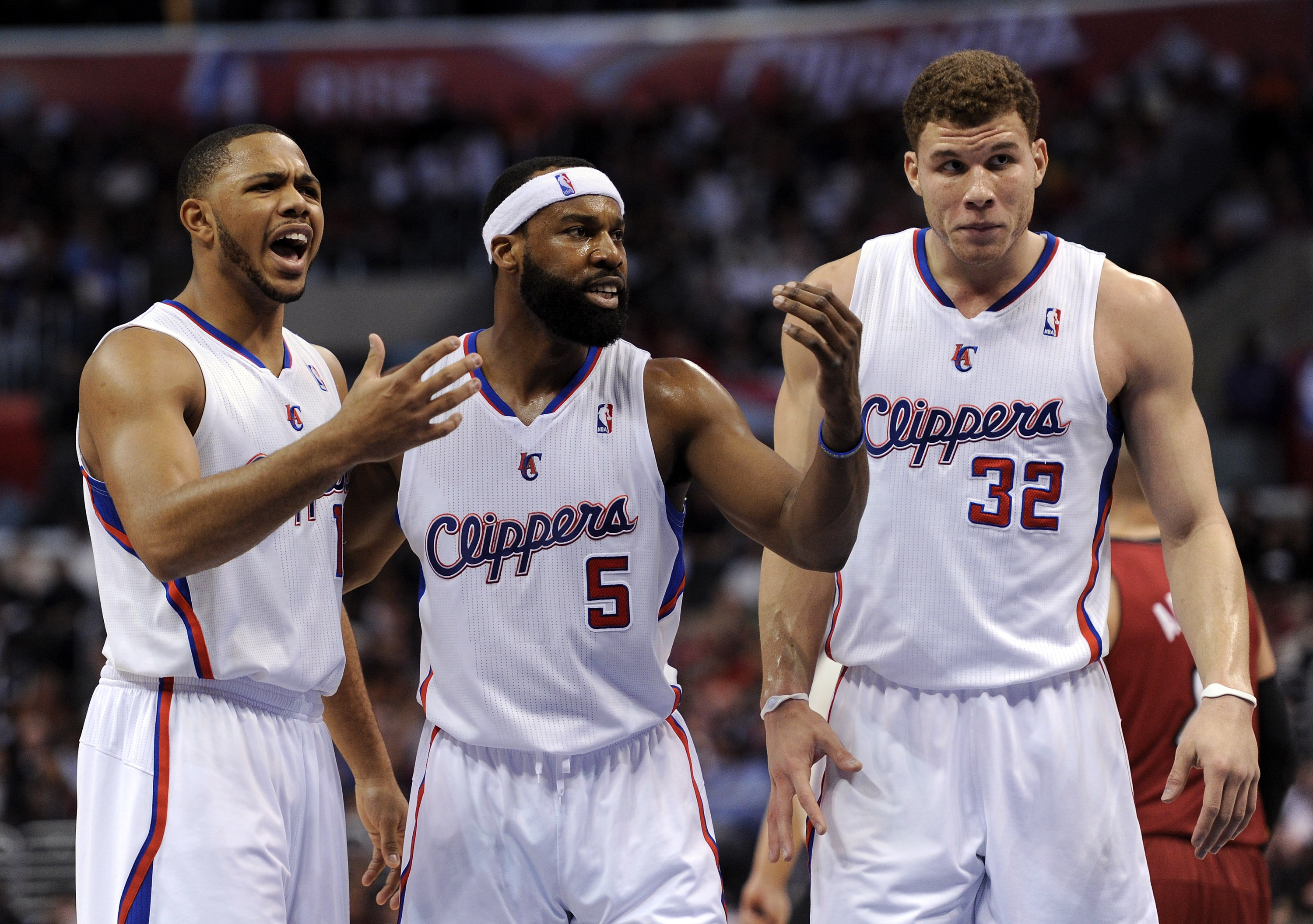 LOS ANGELES, CA - JANUARY 12:  Baron Davis #5, Eric Gordon #10 and Blake Griffin #32 of the Los Angeles Clippers react after a foul during the game against the Miami Heat at the Staples Center on January 12, 2011 in Los Angeles, California.  NOTE TO USER: