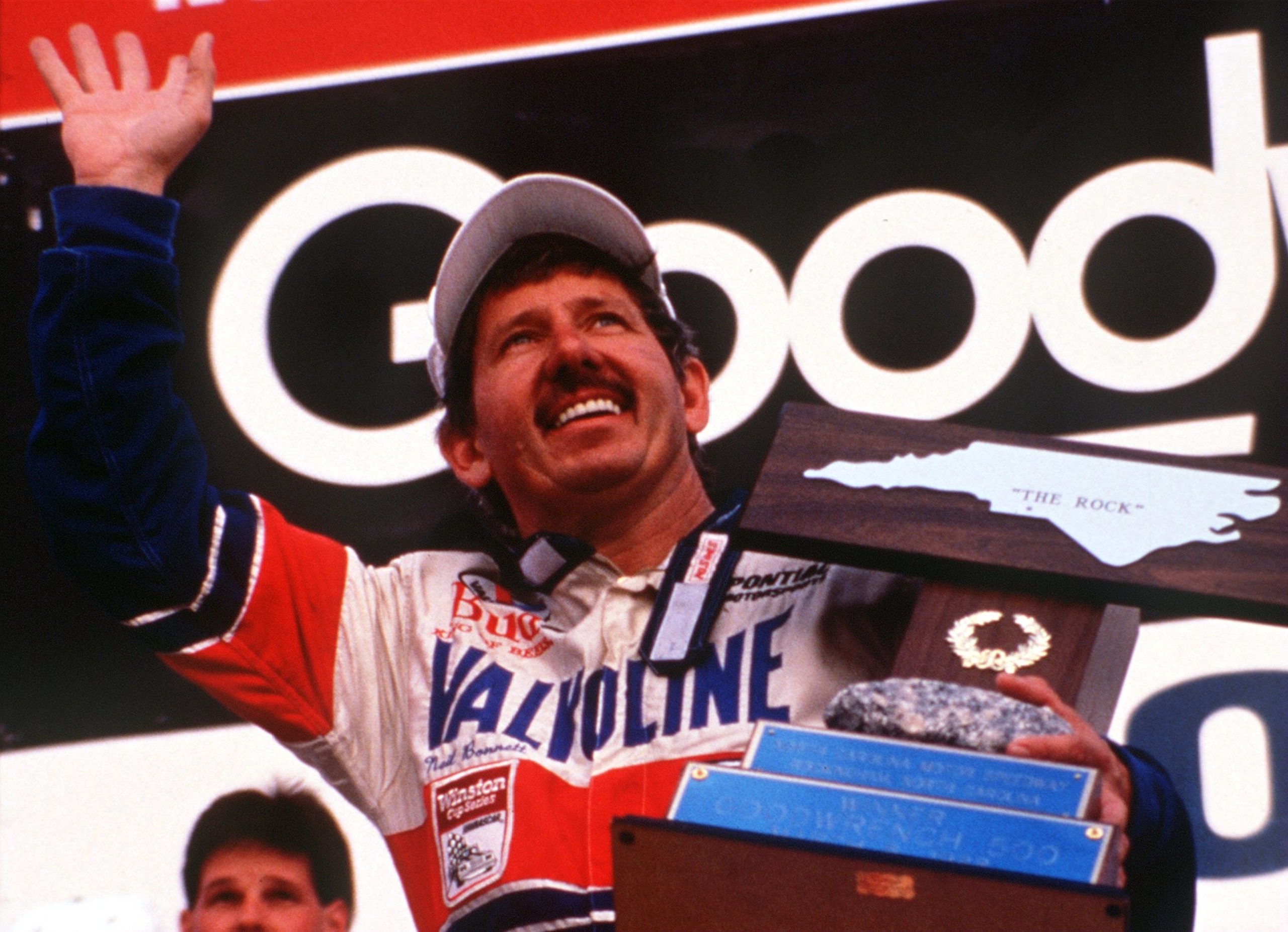 1991:  NEIL BONNETT ON THE PODIUM AFTER WINNING THE 1991 GOODWRENCH 500. Mandatory Credit: BILL HALL/ALLSPORT