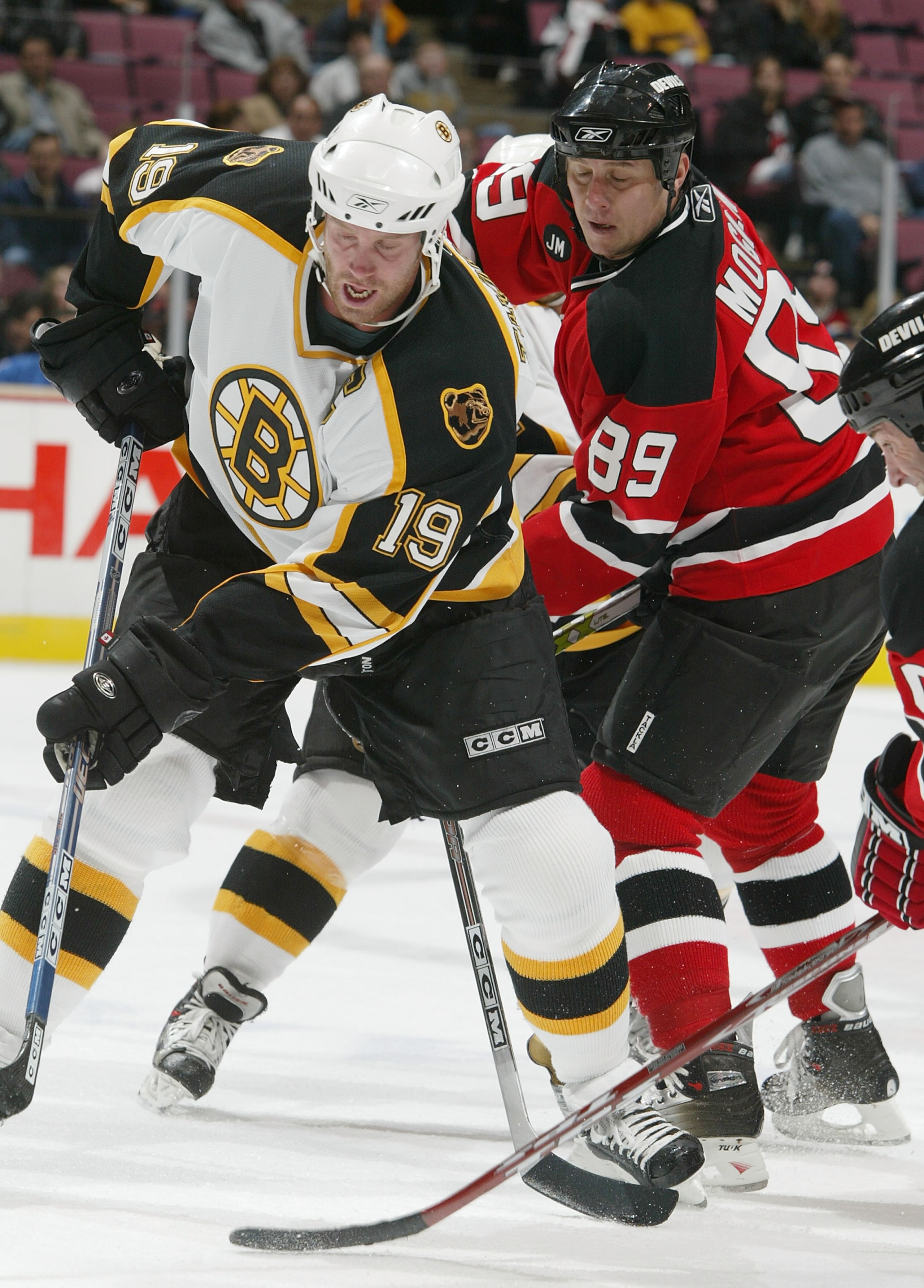 EAST RUTHERFORD, NJ - NOVEMBER 29: Alexander Mogilny #89 of the New Jersey Devils and Joe Thornton #19 of the Boston Bruins during NHL action at the Continental Airlines Arena November 29, 2005 in East Rutherford, New Jersey. (Photo by Andy Marlin/Getty EAST RUTHERFORD, NJ - NOVEMBER 29: Alexander Mogilny #89 of the New Jersey Devils and Joe Thornton #19 of the Boston Bruins during NHL action at the Continental Airlines Arena November 29, 2005 in East Rutherford, New Jersey. (Photo by Andy Marlin/Getty