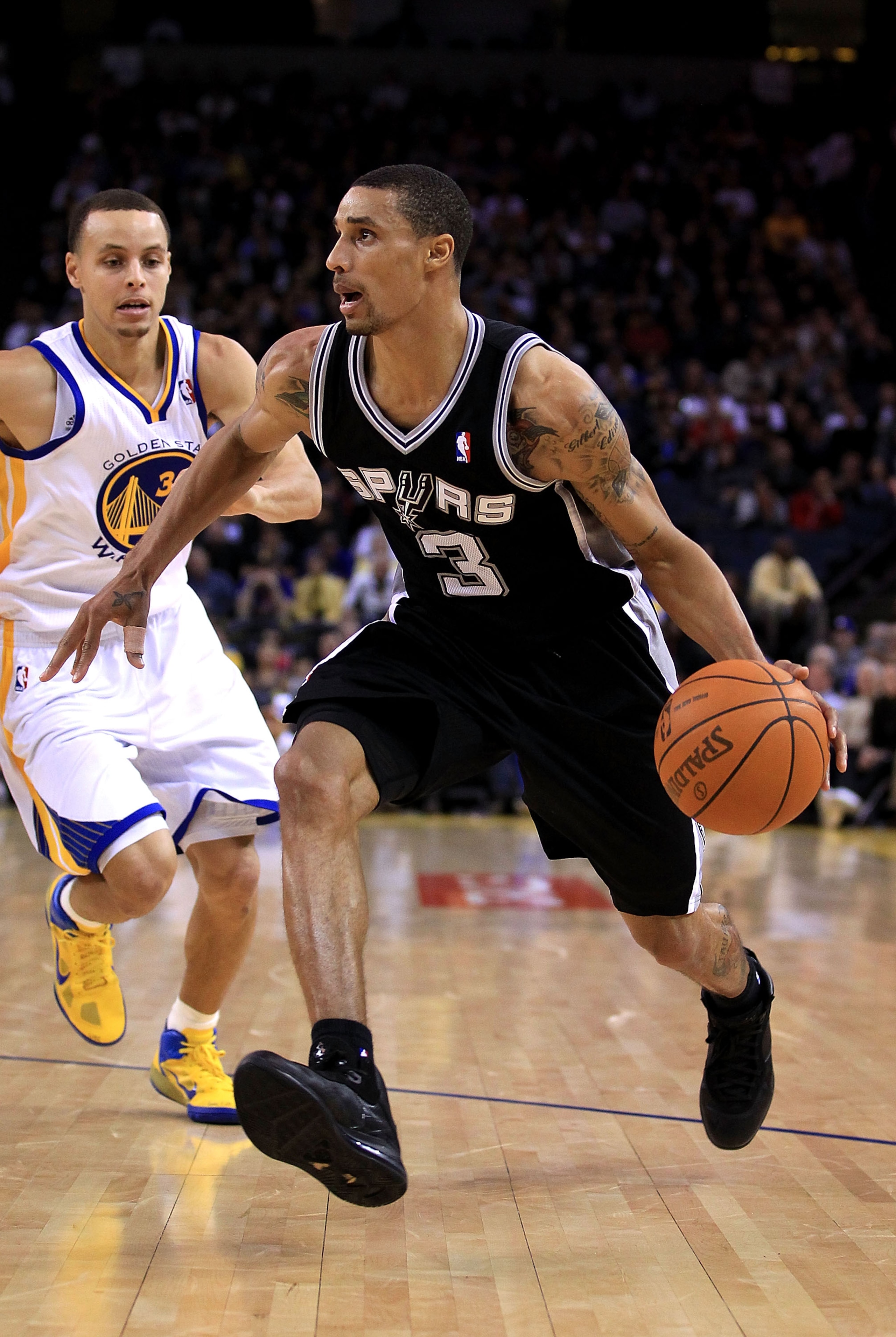 OAKLAND, CA - JANUARY 24: George Hill #3 of the San Antonio Spurs in action against the Golden State Warriors at Oracle Arena on January 24, 2011 in Oakland, California. NOTE TO USER: User expressly acknowledges and agrees that, by downloading and or us OAKLAND, CA - JANUARY 24: George Hill #3 of the San Antonio Spurs in action against the Golden State Warriors at Oracle Arena on January 24, 2011 in Oakland, California. NOTE TO USER: User expressly acknowledges and agrees that, by downloading and or us