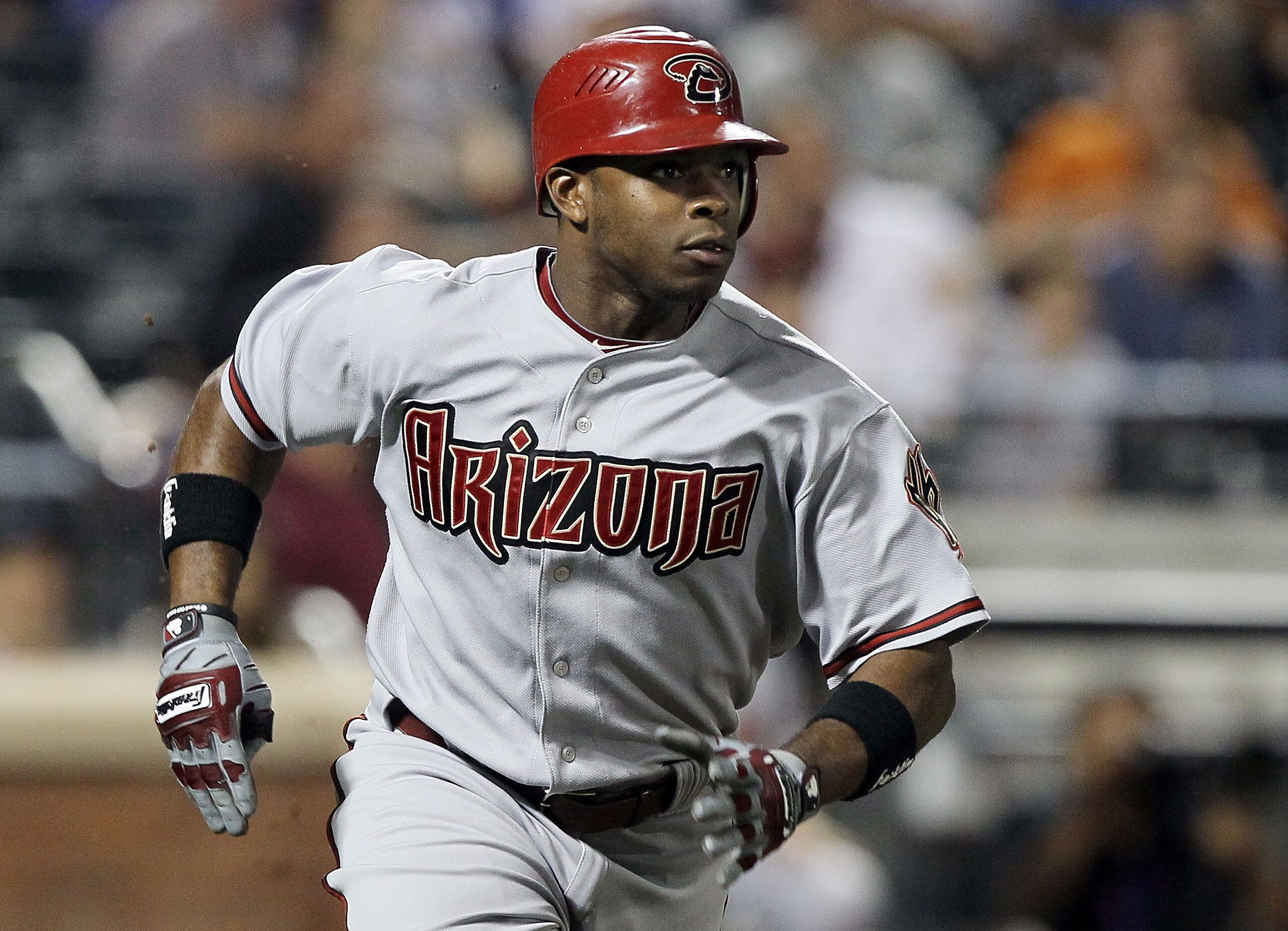 NEW YORK - JULY 31: Justin Upton #10 of the Arizona Diamondbacks runs after hitting a seventh inning two run single against the New York Mets on July 31, 2010 at Citi Field in the Flushing neighborhood of the Queens borough of New York City. (Photo by J NEW YORK - JULY 31: Justin Upton #10 of the Arizona Diamondbacks runs after hitting a seventh inning two run single against the New York Mets on July 31, 2010 at Citi Field in the Flushing neighborhood of the Queens borough of New York City. (Photo by J