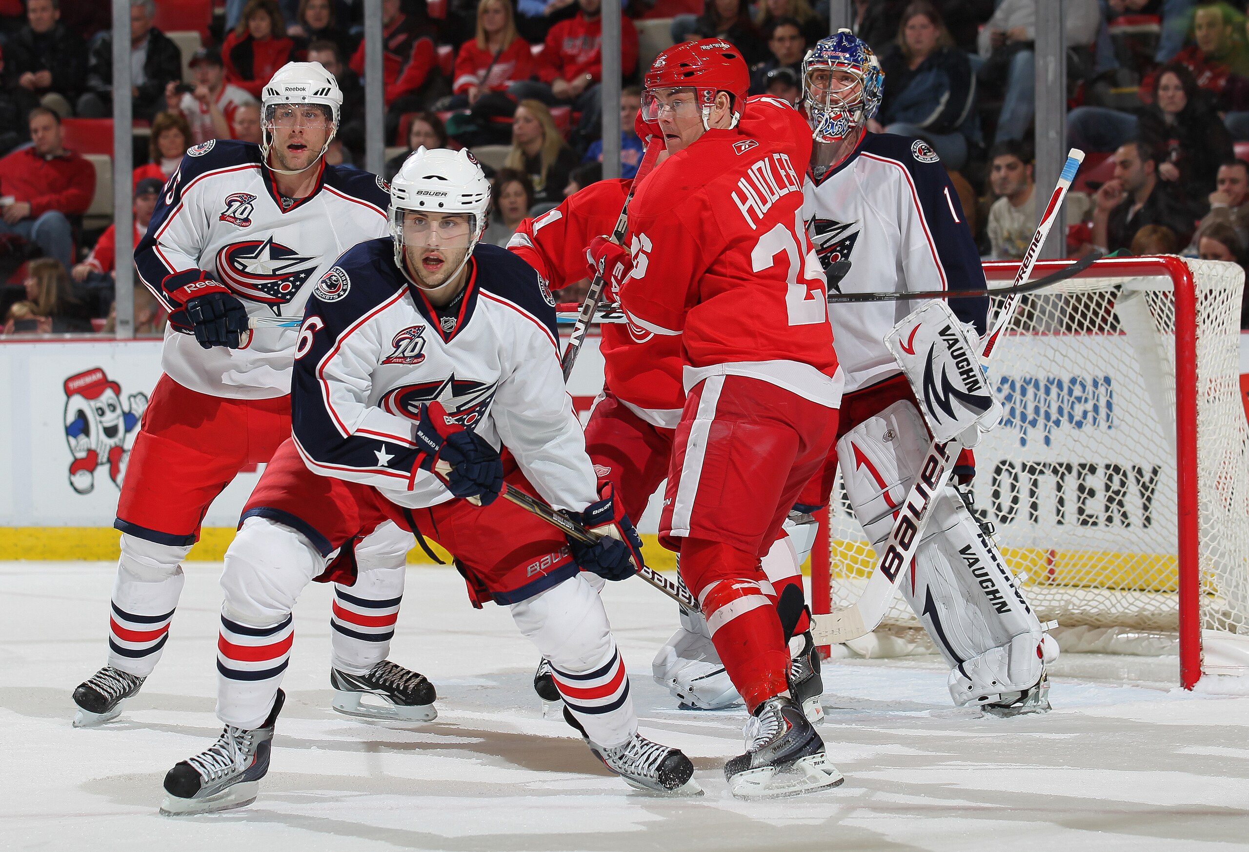 DETROIT, MI - FEBRUARY 4:  Anton Stralman #6 of the Columbus Blue Jackets holds Jiri Hudler #26 of the Detroit Red Wings in check in a game on February 4, 2011 at the Joe Louis Arena in Detroit, Michigan. The Blue Jackets defeated the Wings 3-0. (Photo by