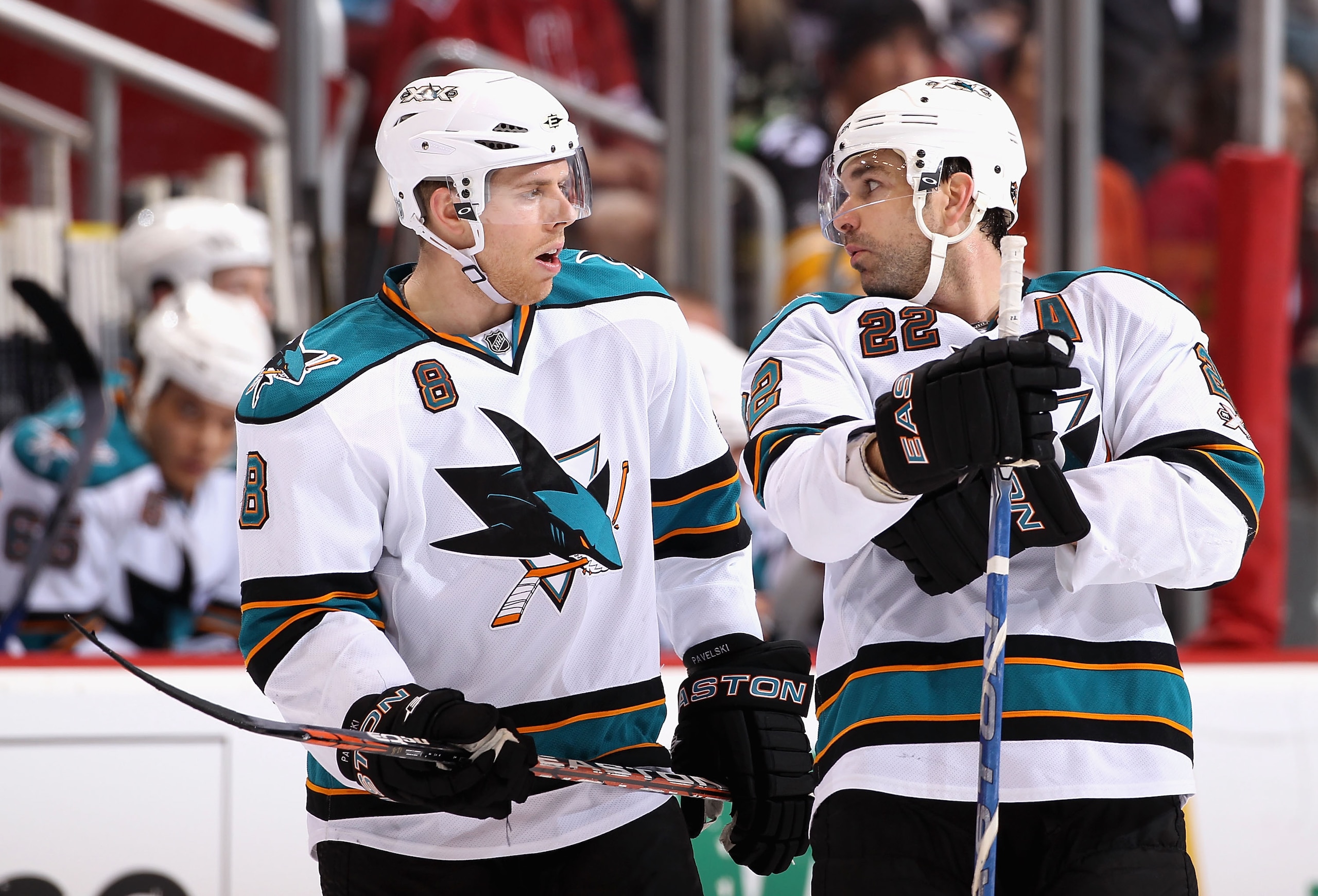 GLENDALE, AZ - JANUARY 17:  Joe Pavelski #8 and Dan Boyle #22 of the San Jose Sharks talk during the NHL game against the Phoenix Coyotes at Jobing.com Arena on January 17, 2011 in Glendale, Arizona.  The Sharks defeated the Coyotes 4-2.  (Photo by Christ