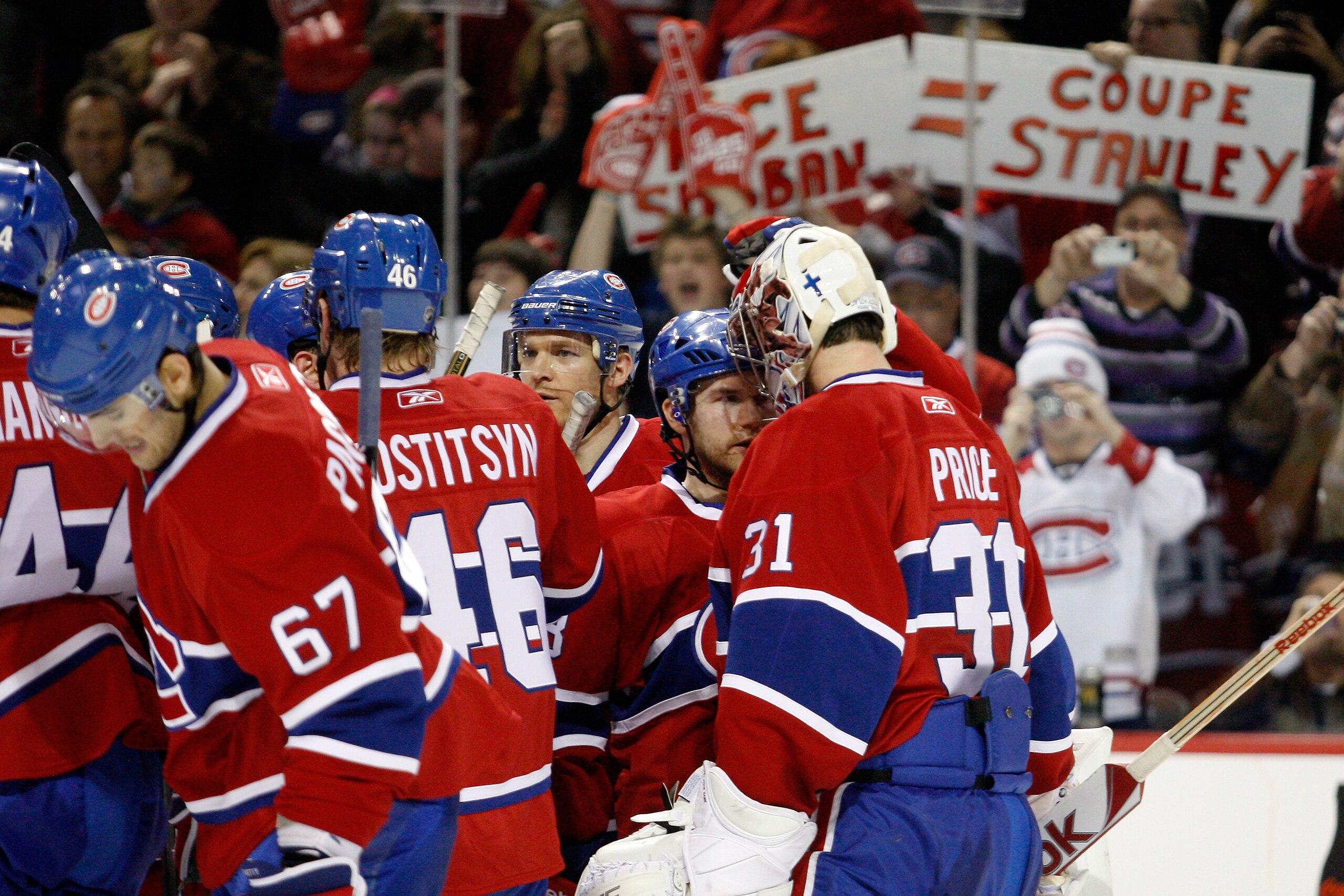 MONTREAL, CANADA - FEBRUARY 5:  Members of the Montreal Canadiens celebrate their victory over the New York Rangers during the NHL game at the Bell Centre on February 5, 2011 in Montreal, Quebec, Canada.  The Canadiens defeated the Rangers 2-0.  (Photo by