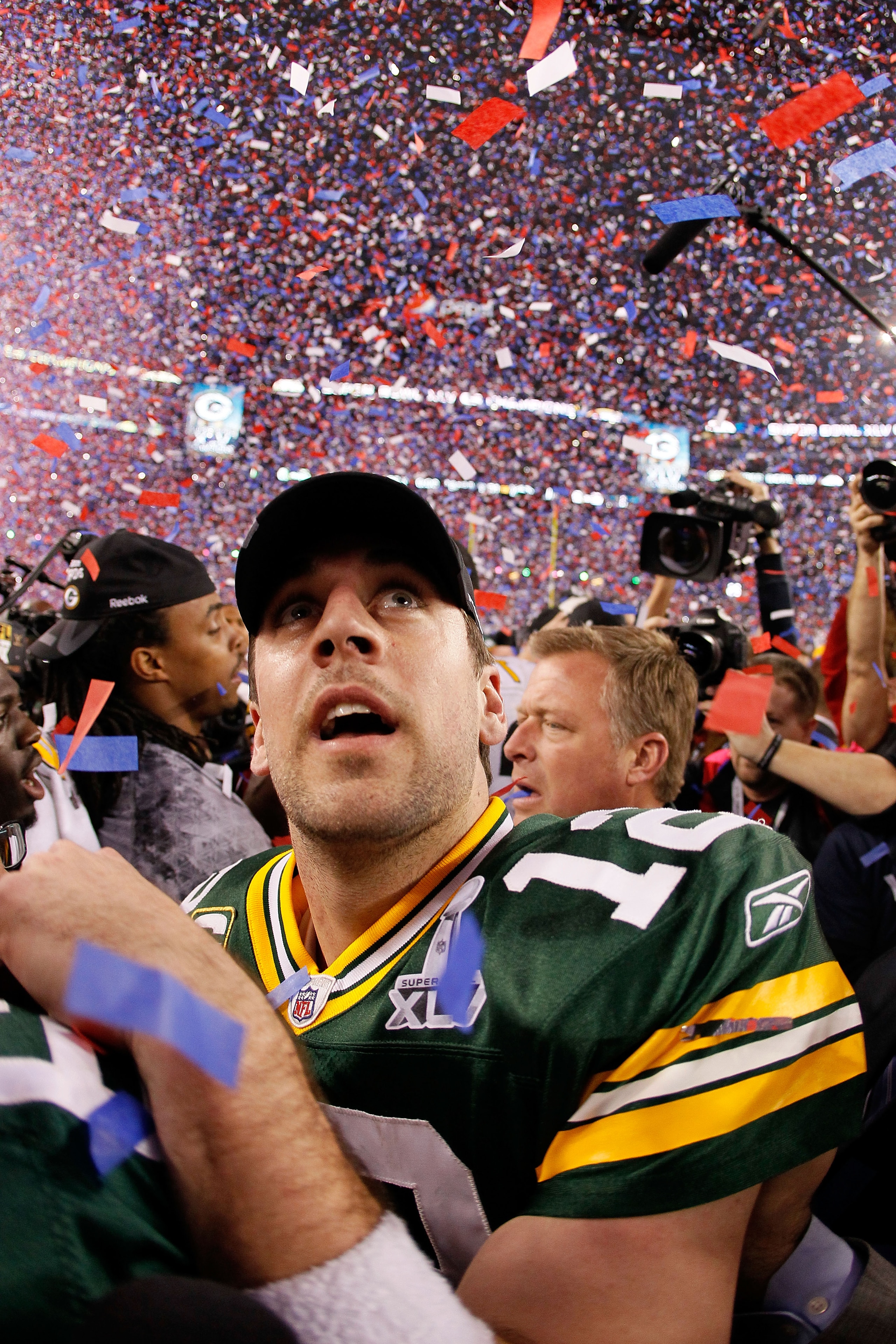 ARLINGTON, TX - FEBRUARY 06:  Super Bowl MVP Aaron Rodgers #12 of the Green Bay Packers celebrates after winning Super Bowl XLV 31-25 against the Pittsburgh Steelers at Cowboys Stadium on February 6, 2011 in Arlington, Texas.  (Photo by Kevin C. Cox/Getty