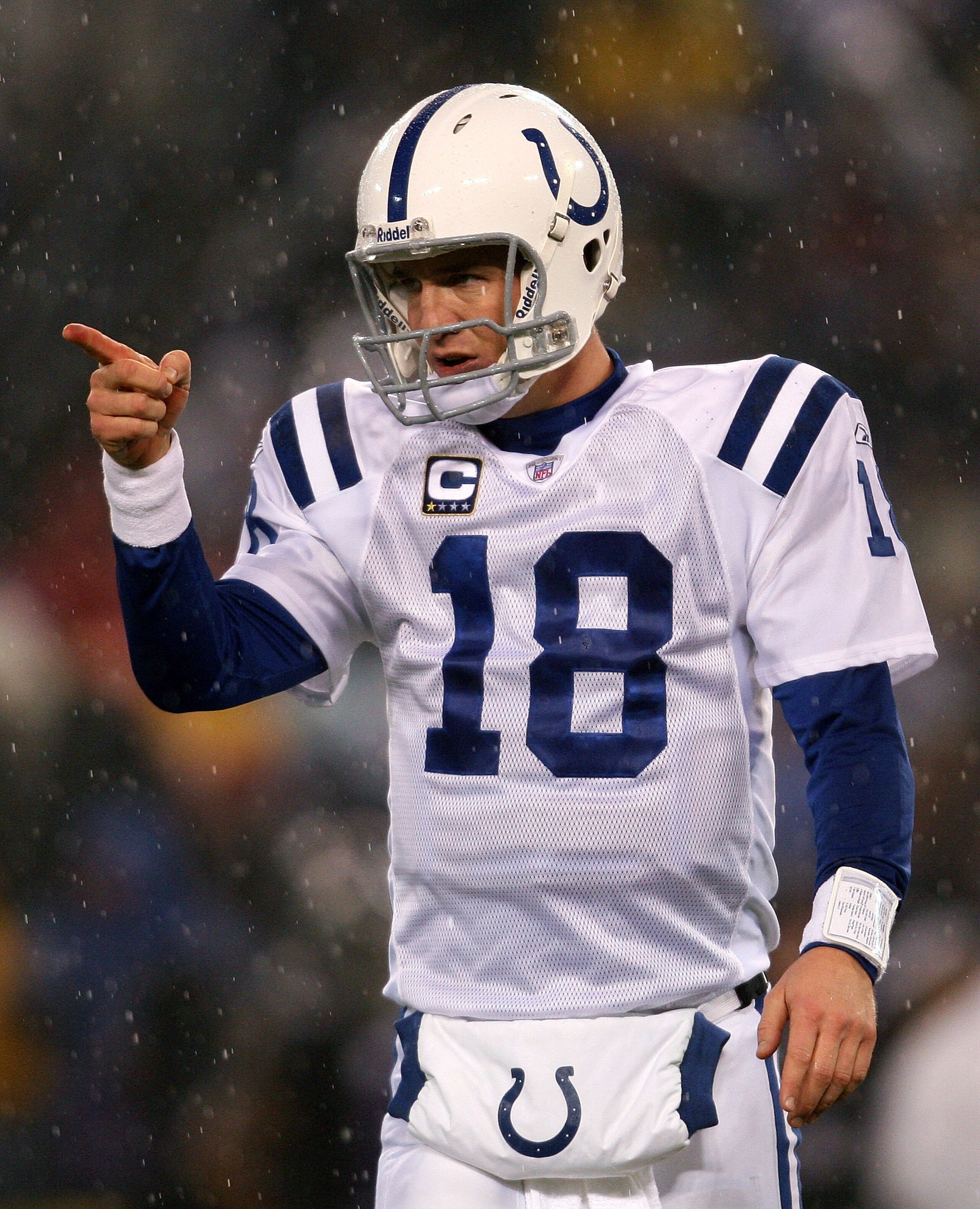BALTIMORE - DECEMBER 09:  Peyton Manning #18 of the Indianapolis Colts points to the sideline after a  touchdown against the Baltimore Ravens during their game on December 9, 2007 at M&T Bank Stadium in Baltimore, Maryland.  (Photo by Nick Laham/Getty Ima