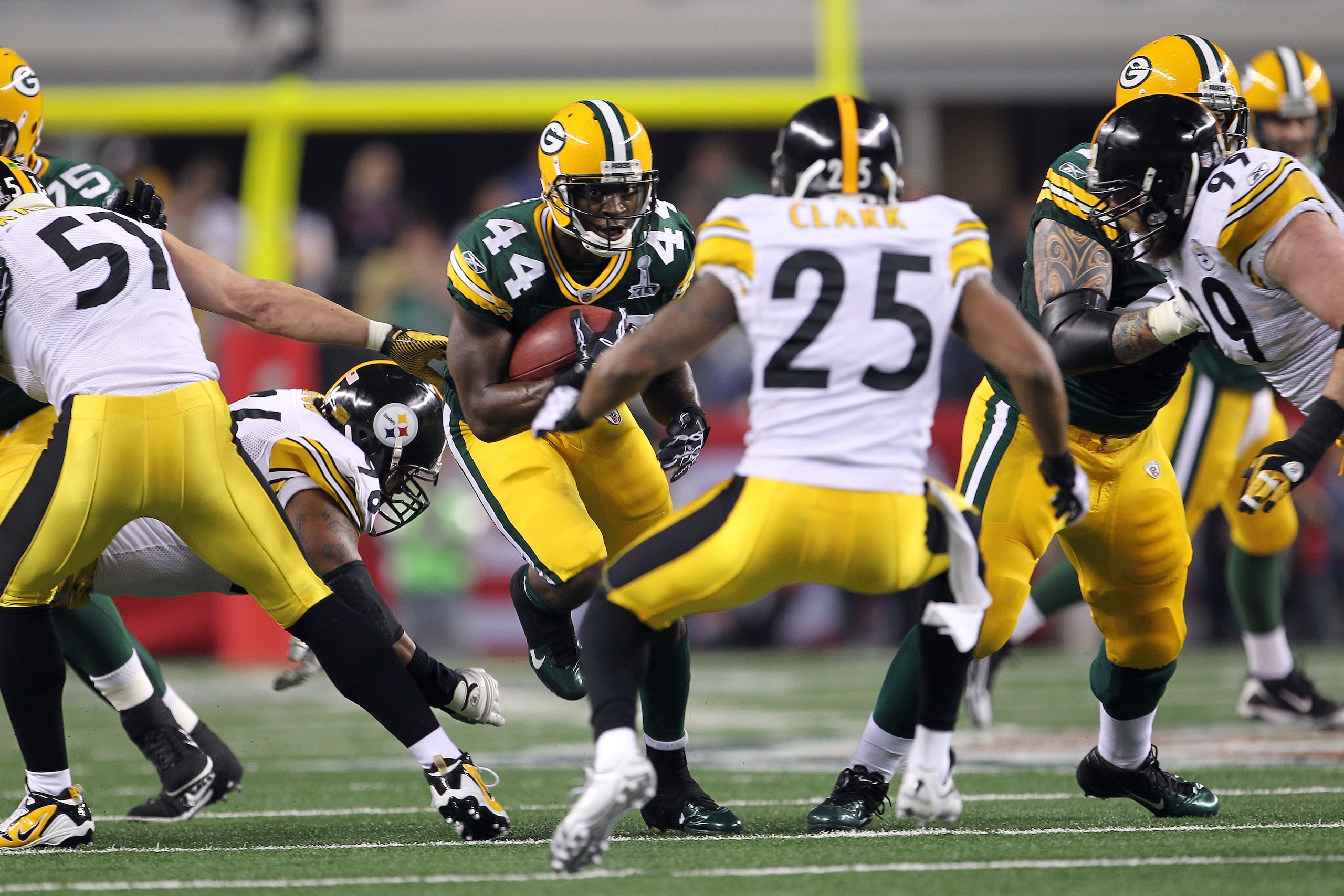 ARLINGTON, TX - FEBRUARY 06: James Starks #44 of the Green Bay Packers runs the ball against Ryan Clark #25 of the Pittsburgh Steelers during Super Bowl XLV at Cowboys Stadium on February 6, 2011 in Arlington, Texas. (Photo by Jamie Squire/Getty Images) ARLINGTON, TX - FEBRUARY 06: James Starks #44 of the Green Bay Packers runs the ball against Ryan Clark #25 of the Pittsburgh Steelers during Super Bowl XLV at Cowboys Stadium on February 6, 2011 in Arlington, Texas. (Photo by Jamie Squire/Getty Images)