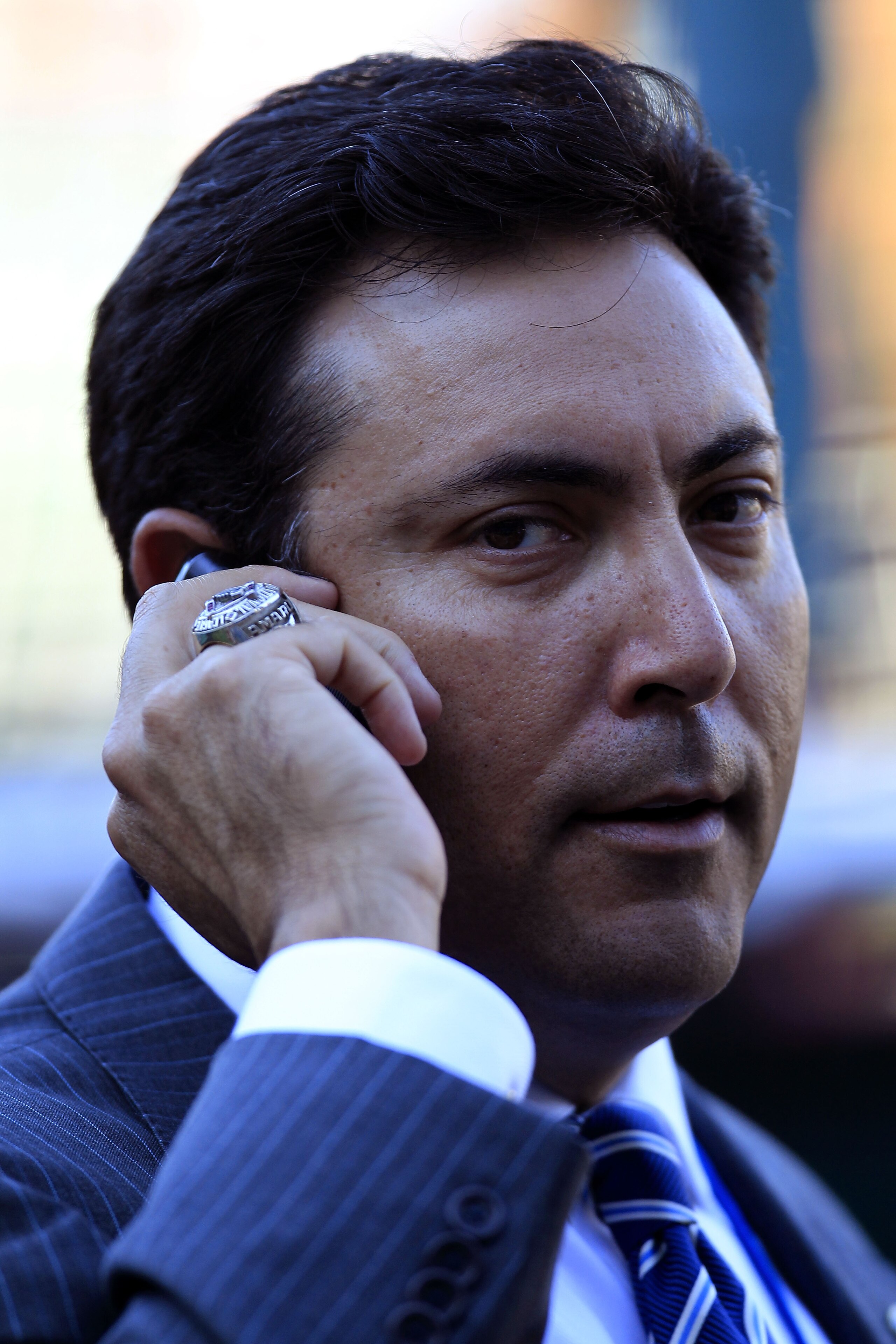 PHILADELPHIA - OCTOBER 08:  General Manager Ruben Amaro Jr. of the Philadelphia Phillies watches batting practice before game 2 of the NLDS against the Cincinnati Reds at Citizens Bank Park on October 8, 2010 in Philadelphia, Pennsylvania.  (Photo by Chri