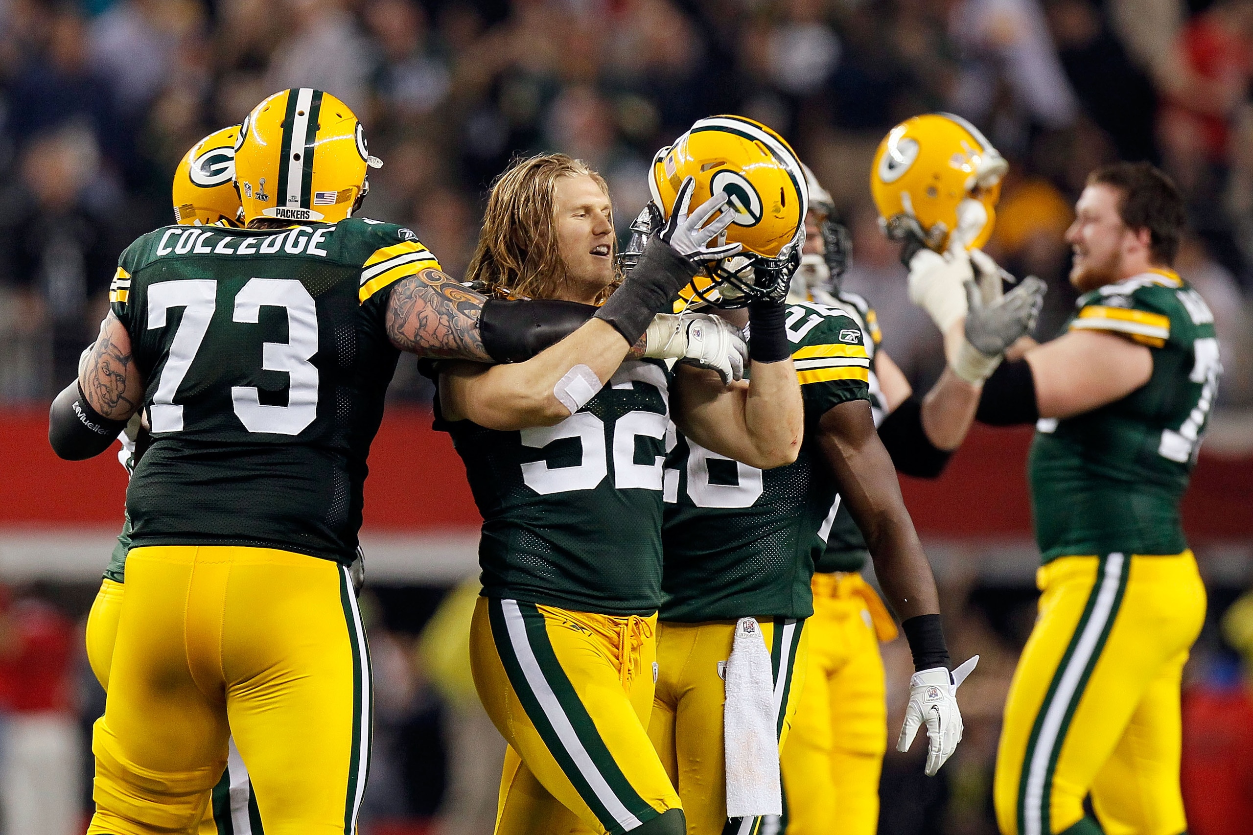 ARLINGTON, TX - FEBRUARY 06: Clay Matthews #52 of the Green Bay Packers celebrates with teammates late in the game against the Pittsburgh Steelers during Super Bowl XLV at Cowboys Stadium on February 6, 2011 in Arlington, Texas.  (Photo by Kevin C. Cox/Ge