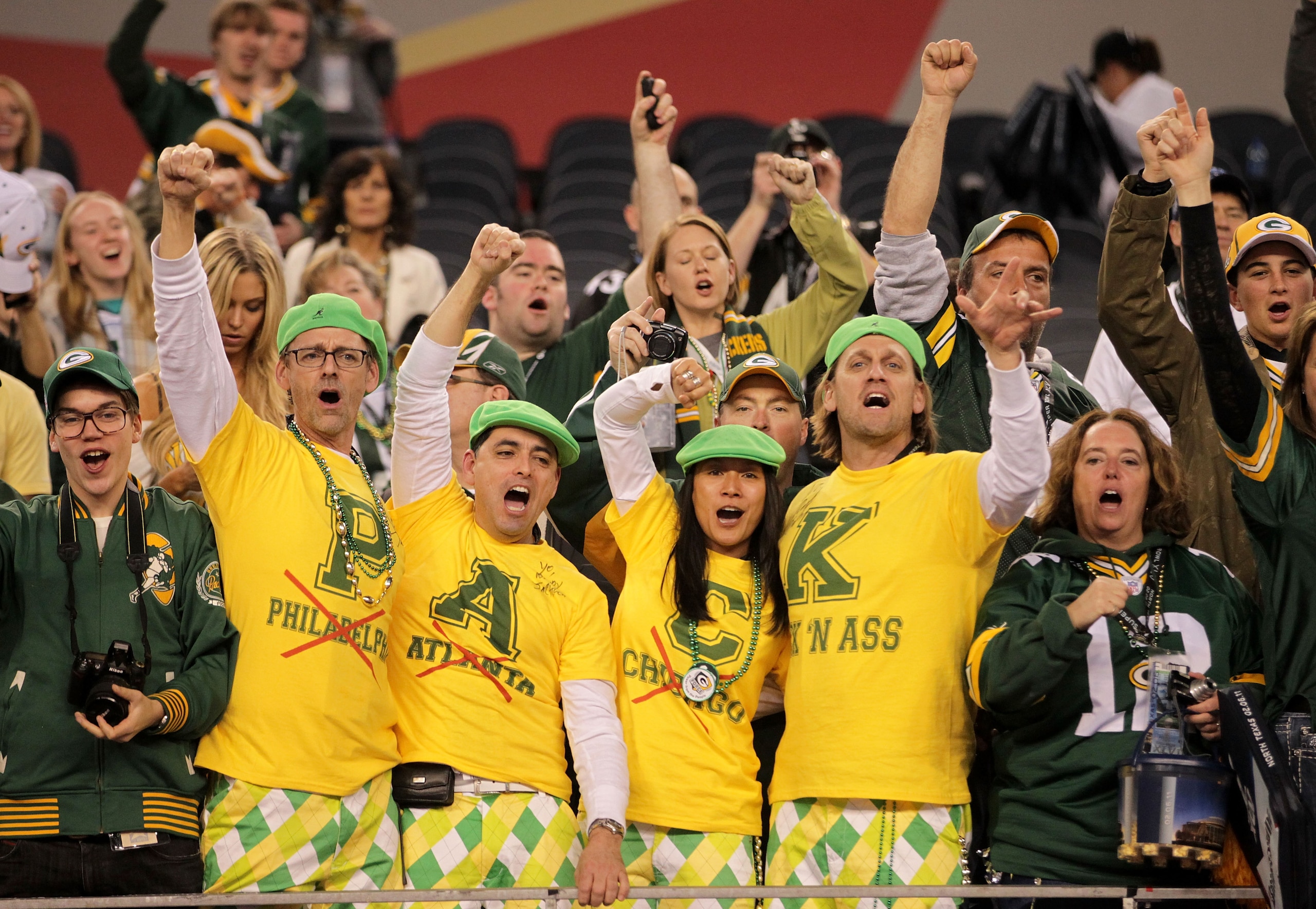 ARLINGTON, TX - FEBRUARY 06:  Green Bay Packers fans celebrate after they defeated the Pittsburgh Steelers 31 to 25 in Super Bowl XLV at Cowboys Stadium on February 6, 2011 in Arlington, Texas.  (Photo by Doug Pensinger/Getty Images)