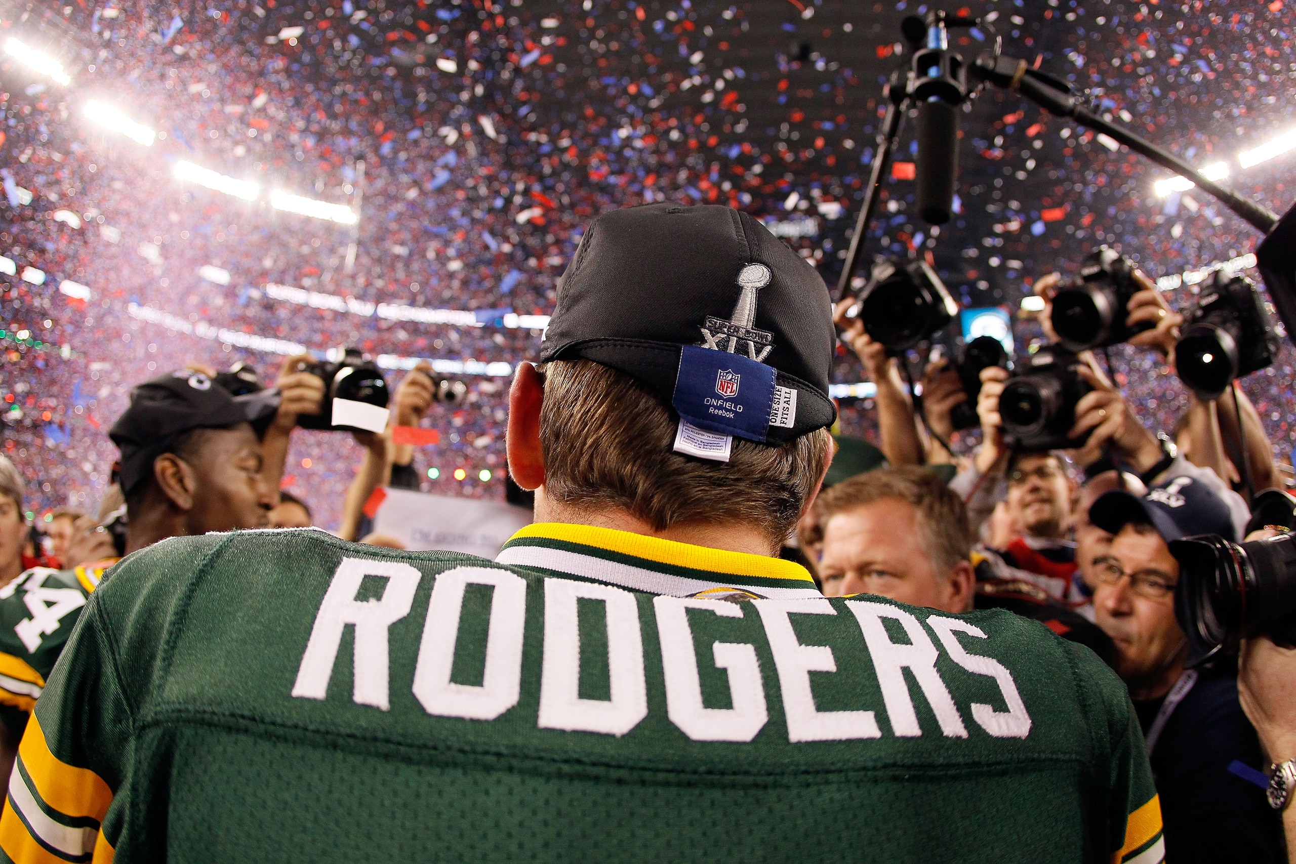 ARLINGTON, TX - FEBRUARY 06:  Super Bowl MVP Aaron Rodgers #12 of the Green Bay Packers celebrates after winning Super Bowl XLV 31-25 against the Pittsburgh Steelers at Cowboys Stadium on February 6, 2011 in Arlington, Texas.  (Photo by Kevin C. Cox/Getty