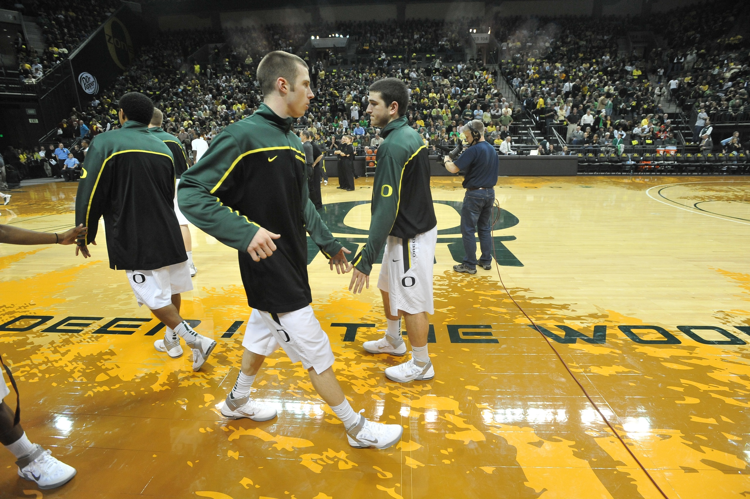 EUGENE, OR - JANUARY 13: Oregon Duck basketball players warm up before the first game between the USC Trojans and the Oregon Ducks basketball teams at Matthew Knight Arena on January 13, 2011 in Eugene, Oregon. The arena is named for Matthew Knight, the s