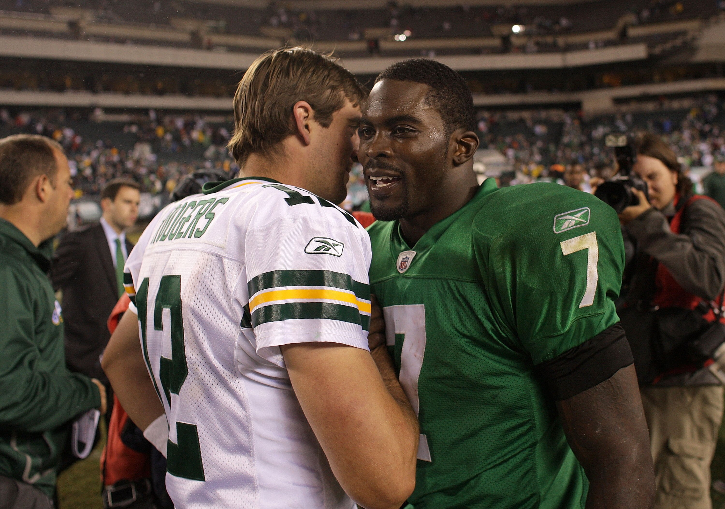 PHILADELPHIA - SEPTEMBER 12:  Michael Vick #7 of the Philadelphia Eagles walks off the field and greets Aaron Rodgers #12 of the Green Bay Packers after a loss at Lincoln Financial Field on September 12, 2010 in Philadelphia, Pennsylvania. The Packers bea