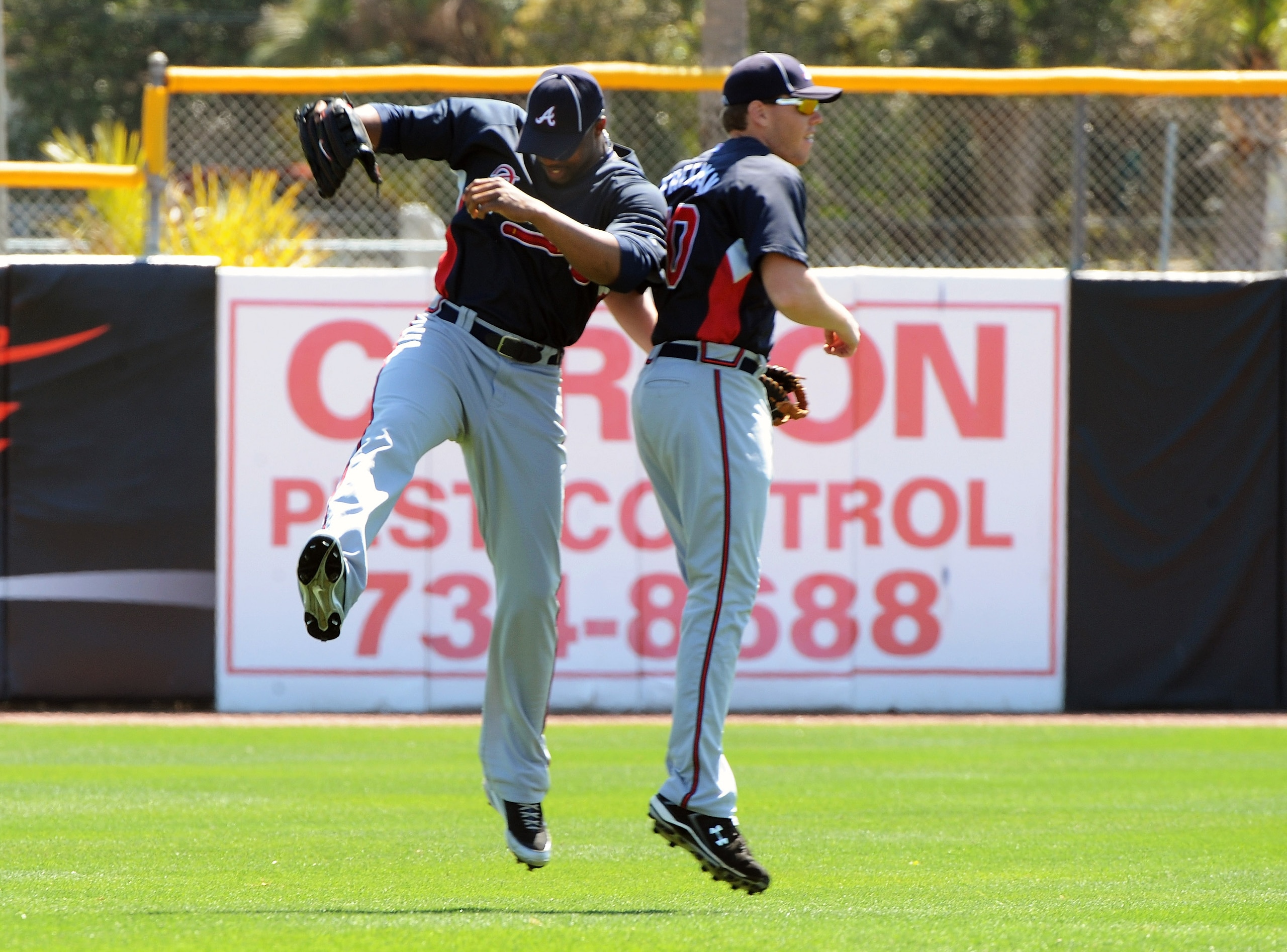 DUNEDIN, FL - MARCH 14: Outfielder Jason Heyward #71 of the Atlanta Braves and infielder Freddie Freeman celebrate before play against the Toronto Blue Jays March 14, 2010 at the Dunedin Stadium in Dunedin, Florida. (Photo by Al Messerschmidt/Getty Image DUNEDIN, FL - MARCH 14: Outfielder Jason Heyward #71 of the Atlanta Braves and infielder Freddie Freeman celebrate before play against the Toronto Blue Jays March 14, 2010 at the Dunedin Stadium in Dunedin, Florida. (Photo by Al Messerschmidt/Getty Image