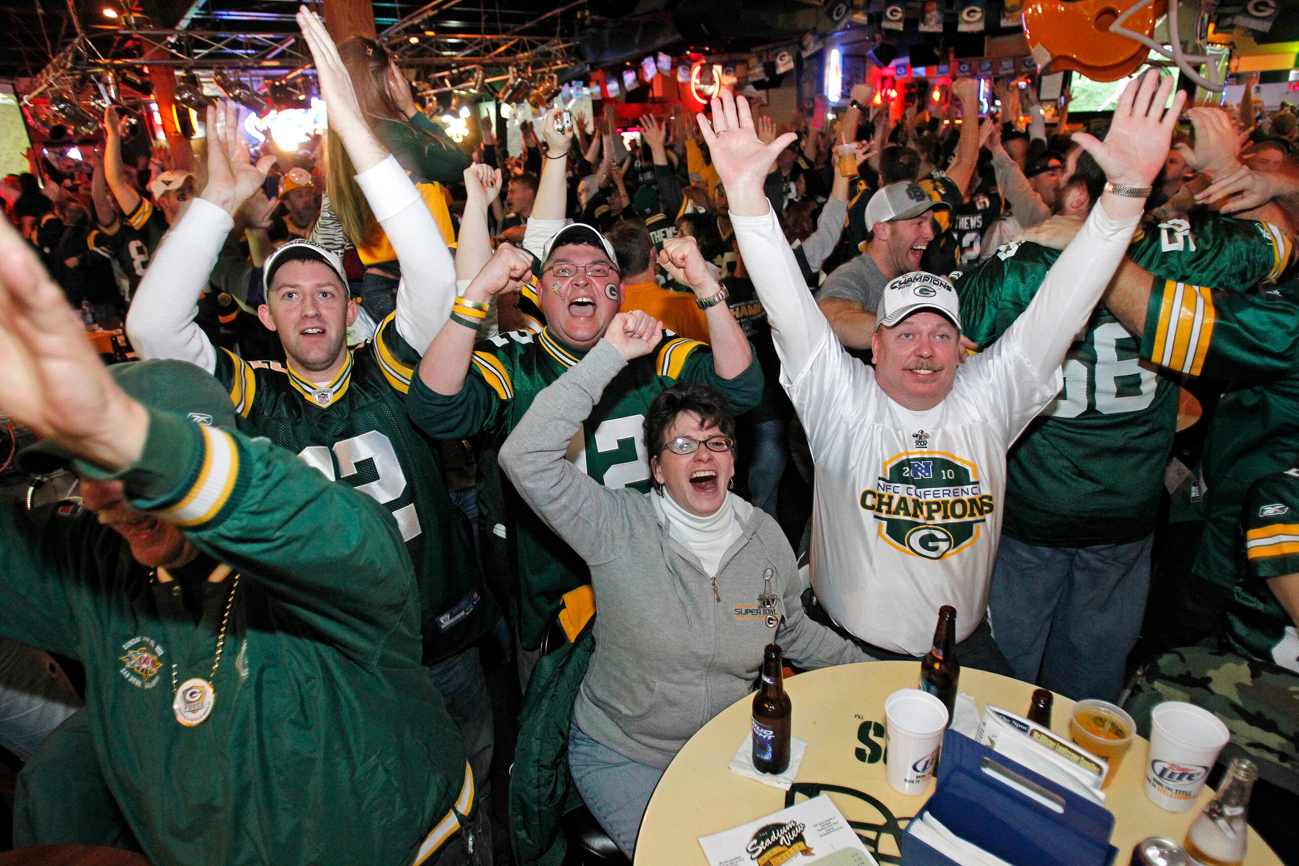 GREEN BAY, WI - FEBRUARY 06: Green Bay Packers fans react after watching the Green Bay Packers defeat the Pittsburgh Steelers in the Super Bowl at Stadium View Bar February 6, 2011 in Green Bay, Wisconsin.  (Photo by Matt Ludtke/Getty Images)