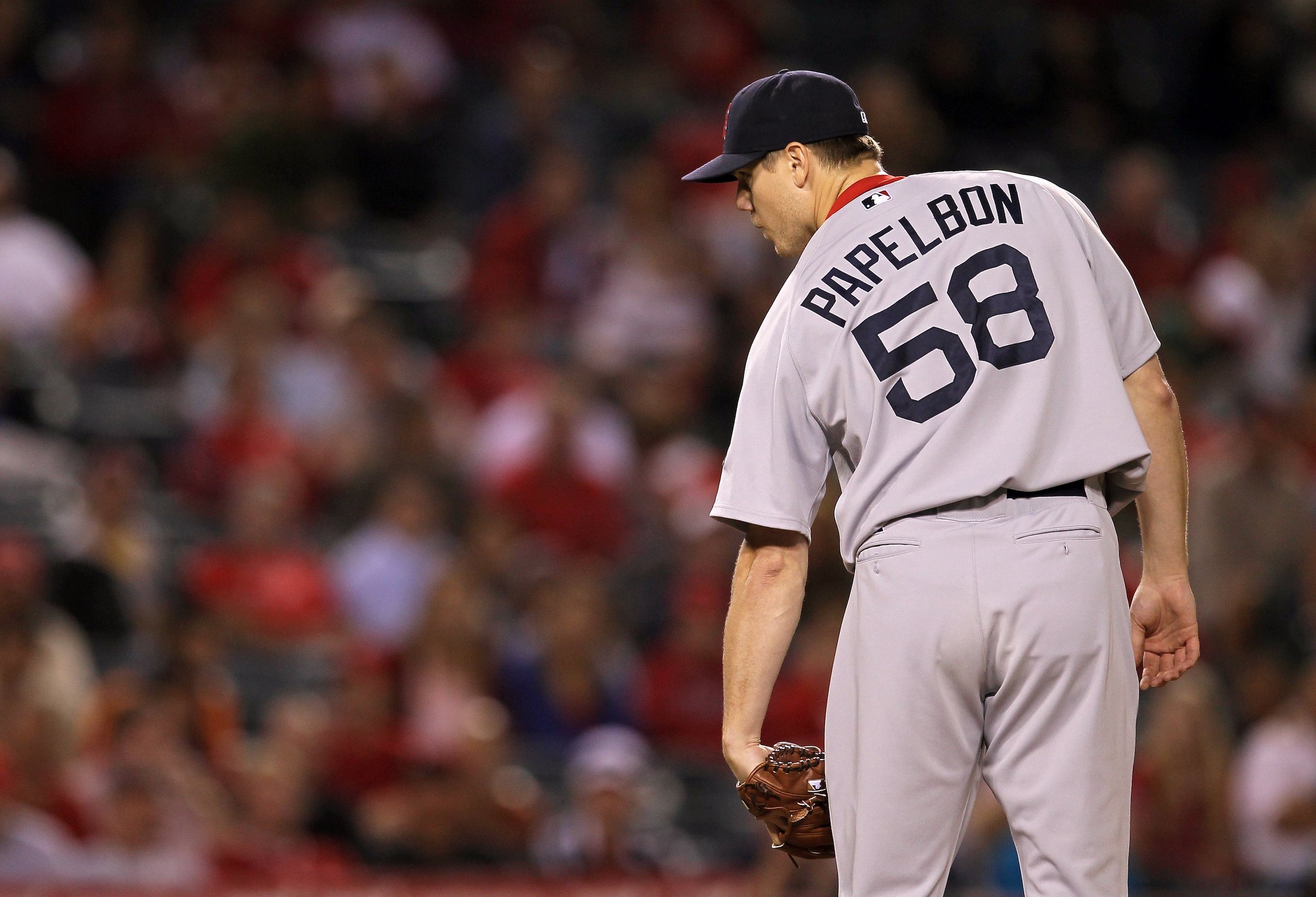 ANAHEIM, CA - JULY 27:  Closer Jonathan Paplebon #58 of the Boston Red Sox sets to deliver a pitch on his way to picking up the save against the Los Angeles Angels of Anaheim on July 27, 2010 at Angel Stadium in Anaheim, California. The Red Sox won 4-2.
