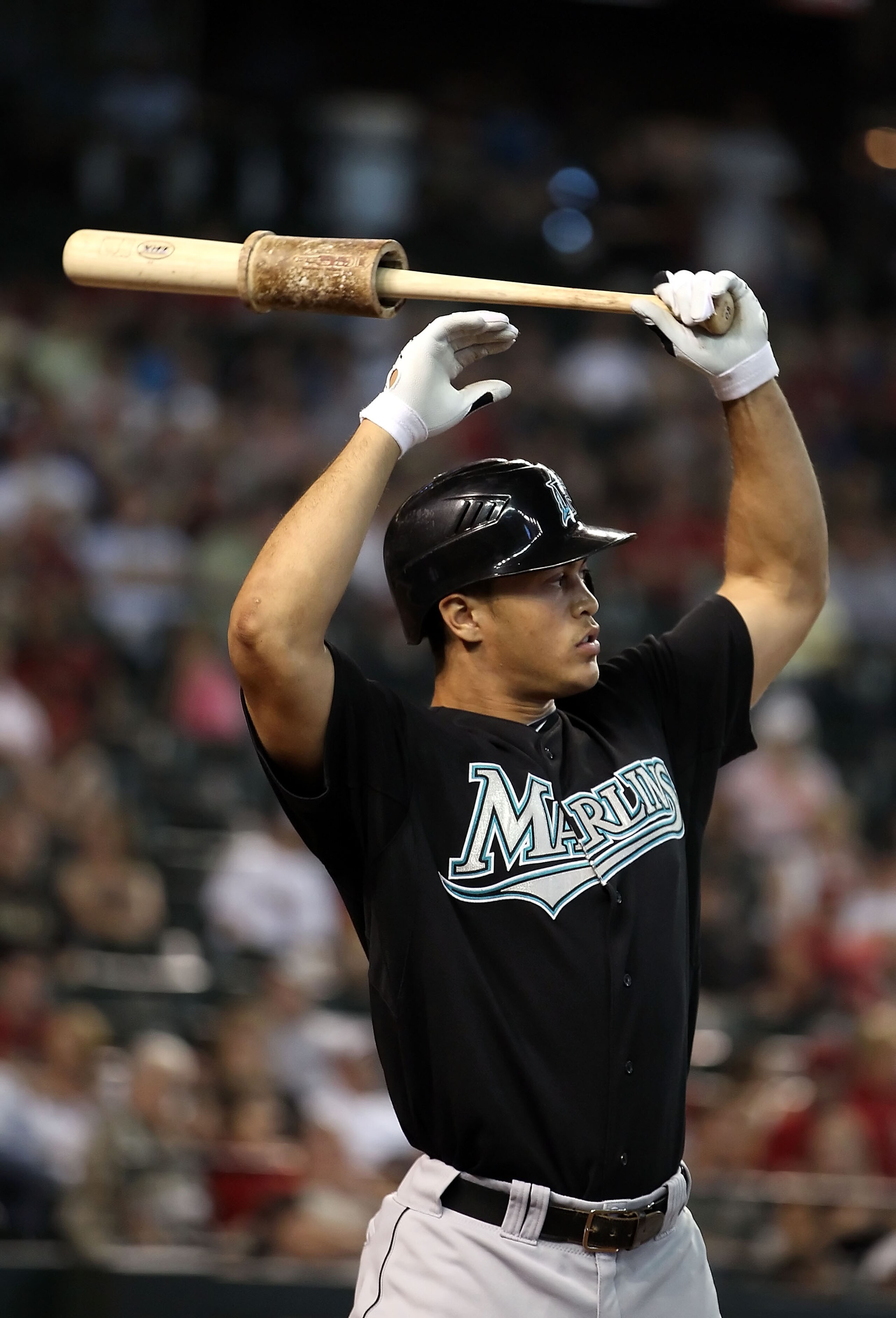 PHOENIX - JULY 11: Mike Stanton #27 of the Florida Marlins warms up on deck during the Major League Baseball game against the Arizona Diamondbacks at Chase Field on July 11, 2010 in Phoenix, Arizona. The Marlins defeated the Diamondbacks 2-0. (Photo by PHOENIX - JULY 11: Mike Stanton #27 of the Florida Marlins warms up on deck during the Major League Baseball game against the Arizona Diamondbacks at Chase Field on July 11, 2010 in Phoenix, Arizona. The Marlins defeated the Diamondbacks 2-0. (Photo by