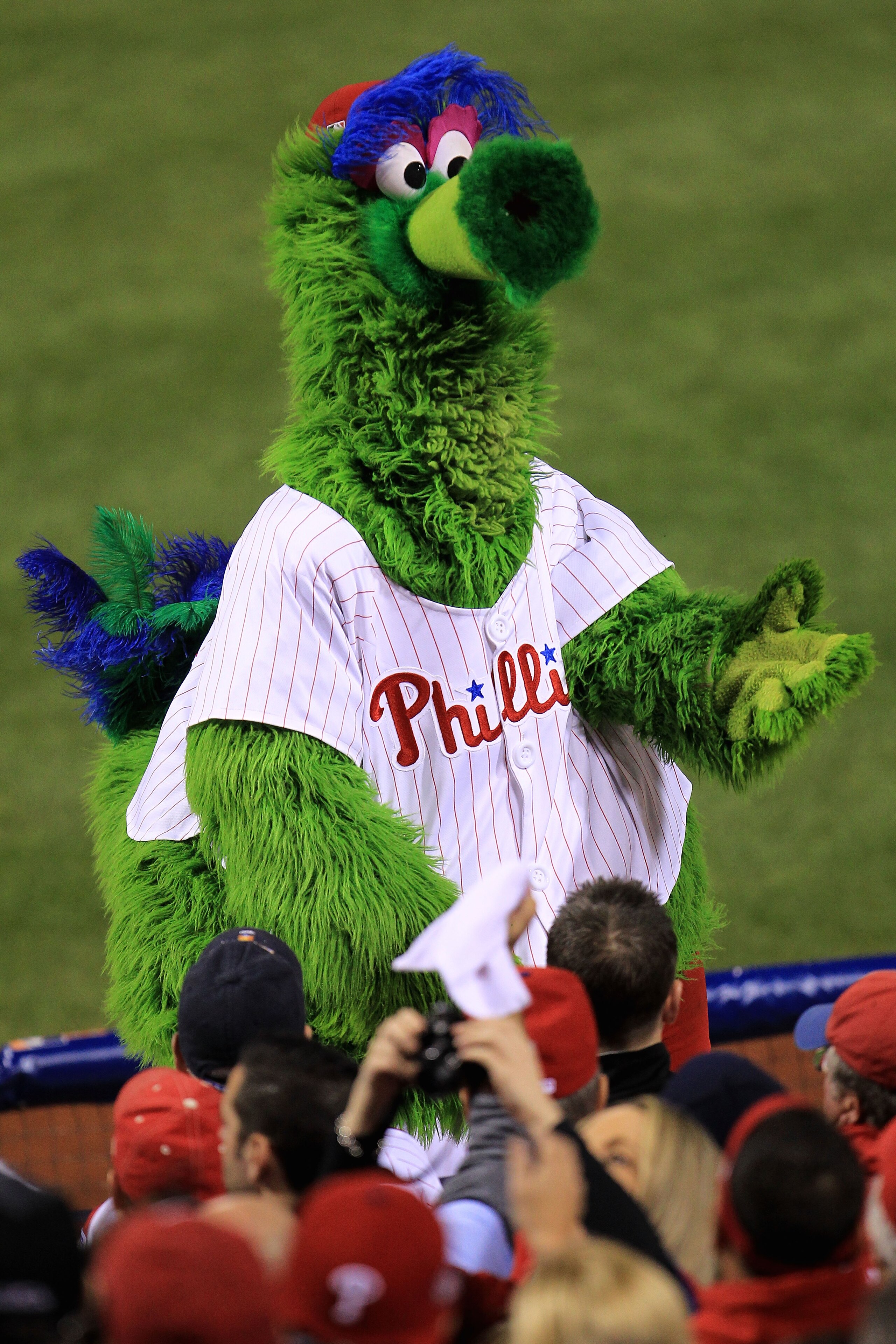 PHILADELPHIA - OCTOBER 17: The Phillie Phanatic pumps up the crowd as the Phillies take on the San Francisco Giants in Game Two of the NLCS during the 2010 MLB Playoffs at Citizens Bank Park on October 17, 2010 in Philadelphia, Pennsylvania. (Photo by C PHILADELPHIA - OCTOBER 17: The Phillie Phanatic pumps up the crowd as the Phillies take on the San Francisco Giants in Game Two of the NLCS during the 2010 MLB Playoffs at Citizens Bank Park on October 17, 2010 in Philadelphia, Pennsylvania. (Photo by C