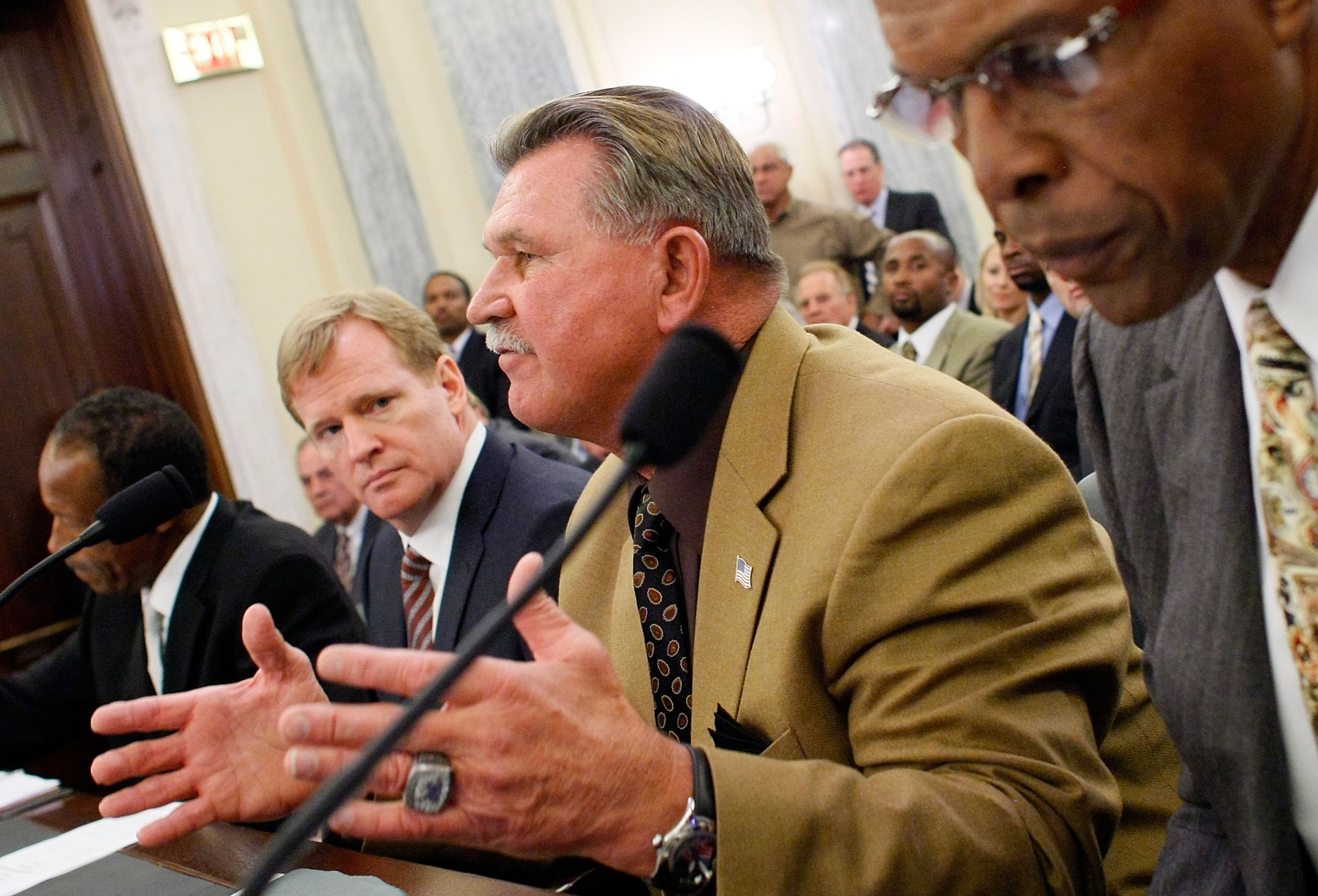 WASHINGTON - SEPTEMBER 18: Pro Football Hall of Fame player and coach Mike Ditka (2nd R) testifes during a hearing of the Senate Commerce, Science and Transportation Committee with (L-R) NFL Players Association Executive Director Gene Upshaw, NFL Commiss WASHINGTON - SEPTEMBER 18: Pro Football Hall of Fame player and coach Mike Ditka (2nd R) testifes during a hearing of the Senate Commerce, Science and Transportation Committee with (L-R) NFL Players Association Executive Director Gene Upshaw, NFL Commiss