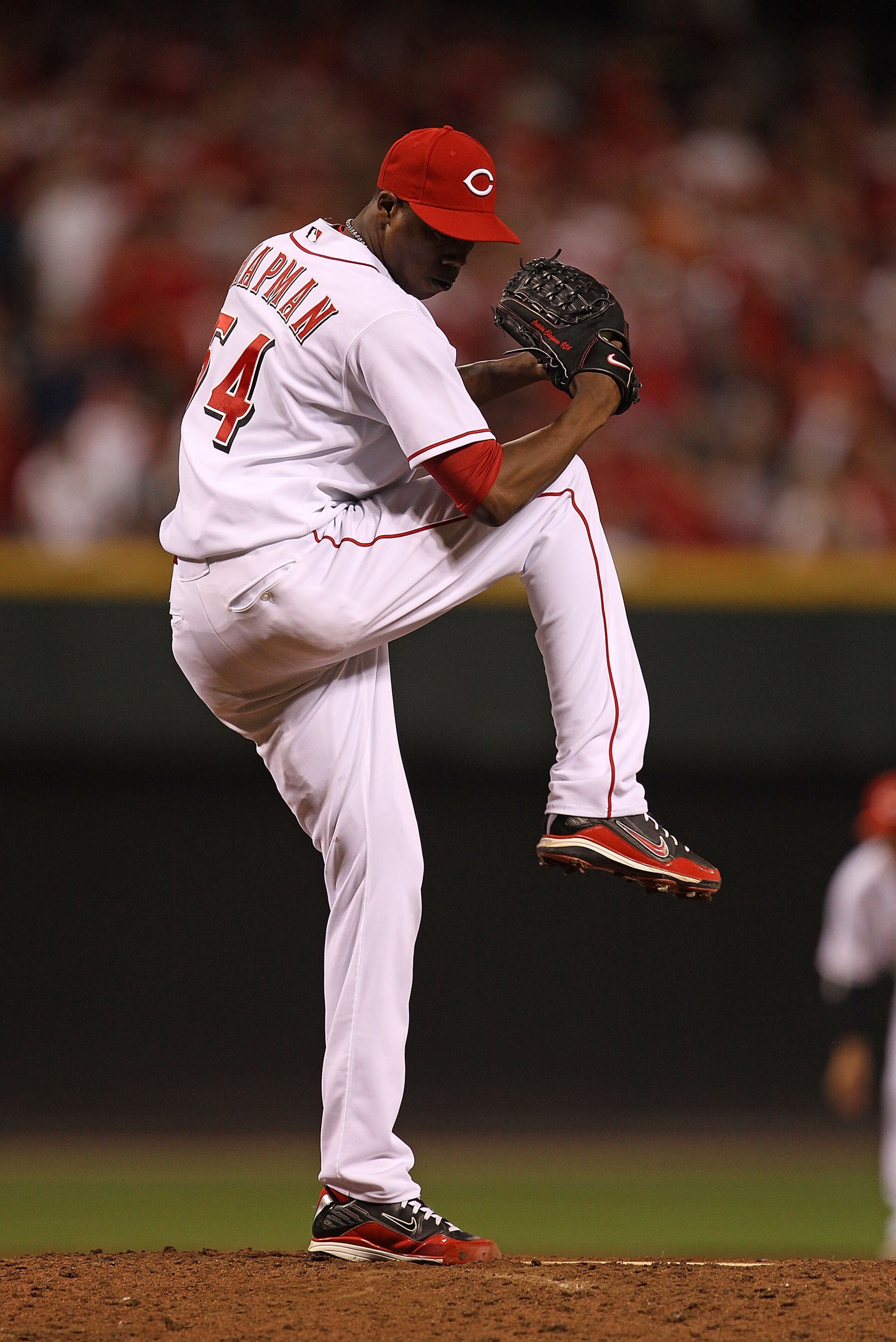 CINCINNATI - OCTOBER 10: Aroldis Chapman #54 of the Cincinnati Reds pitches in the 9th inning against the Philadelphia Phillies during game 3 of the NLDS at Great American Ball Park on October 10, 2010 in Cincinnati, Ohio. The Phillies defeated the Reds 2 CINCINNATI - OCTOBER 10: Aroldis Chapman #54 of the Cincinnati Reds pitches in the 9th inning against the Philadelphia Phillies during game 3 of the NLDS at Great American Ball Park on October 10, 2010 in Cincinnati, Ohio. The Phillies defeated the Reds 2