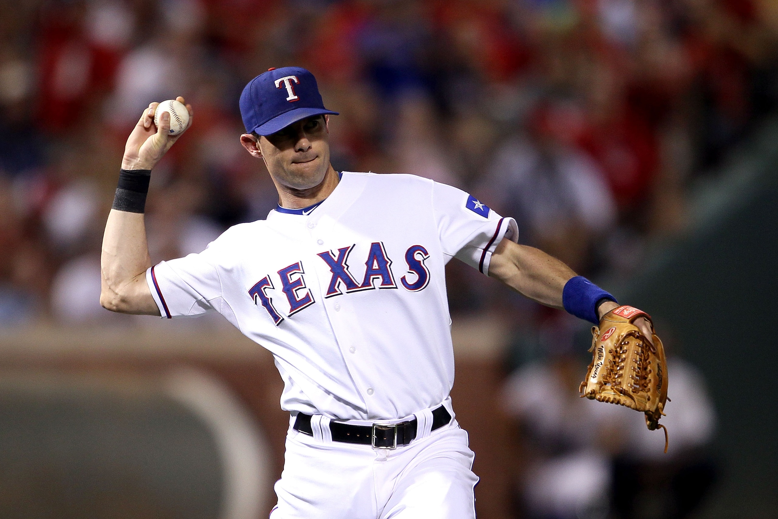 ARLINGTON, TX - OCTOBER 22: Michael Young #10 of the Texas Rangers throws the ball against the New York Yankees in Game Six of the ALCS during the 2010 MLB Playoffs at Rangers Ballpark in Arlington on October 22, 2010 in Arlington, Texas. (Photo by Elsa ARLINGTON, TX - OCTOBER 22: Michael Young #10 of the Texas Rangers throws the ball against the New York Yankees in Game Six of the ALCS during the 2010 MLB Playoffs at Rangers Ballpark in Arlington on October 22, 2010 in Arlington, Texas. (Photo by Elsa