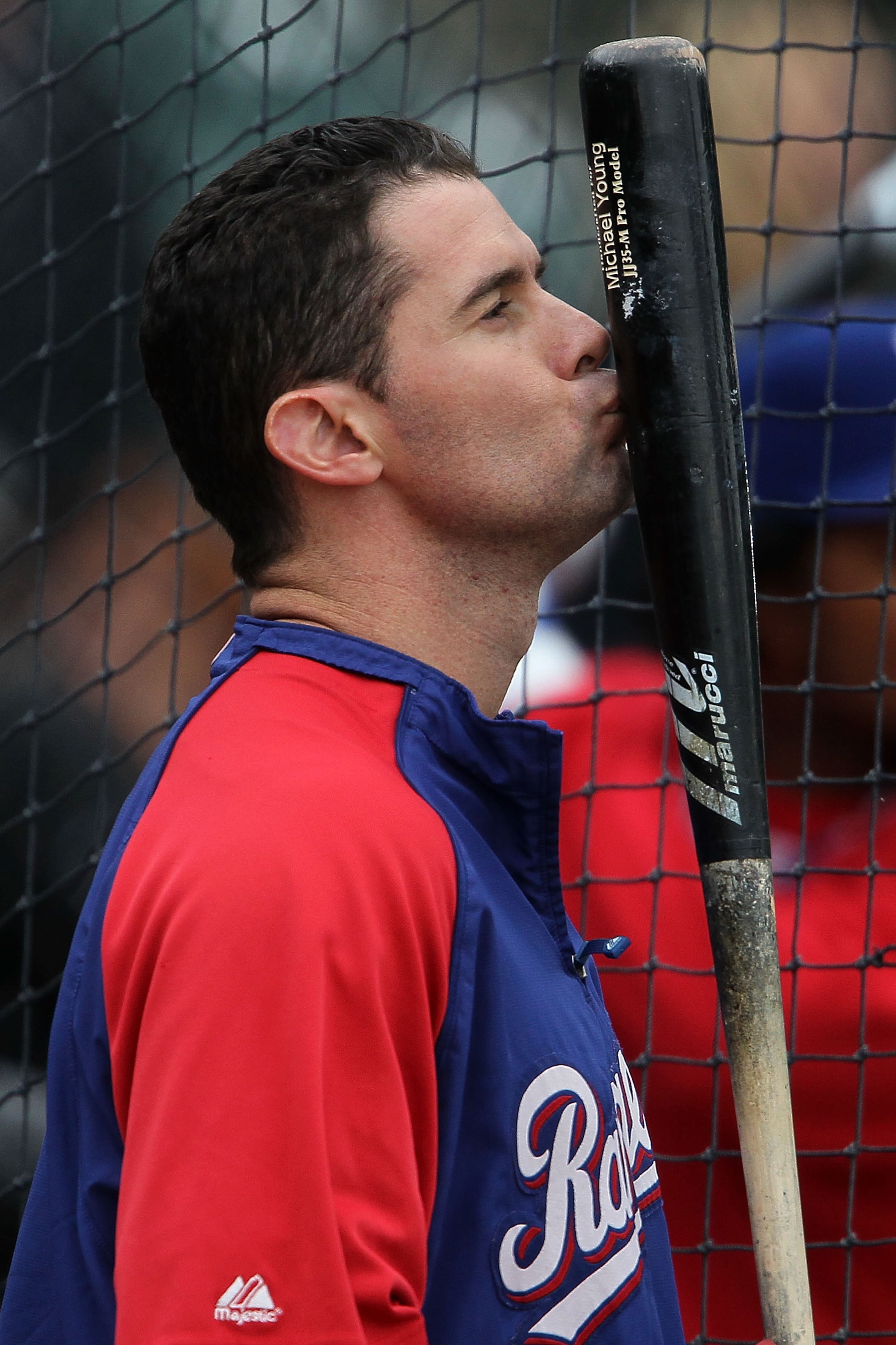 SAN FRANCISCO - OCTOBER 28: Michael Young #10 of the Texas Rangers kisses his bat during batting practice before Game Two of the 2010 MLB World Series against the San Francisco Giants at AT&T Park on October 28, 2010 in San Francisco, California. (Photo SAN FRANCISCO - OCTOBER 28: Michael Young #10 of the Texas Rangers kisses his bat during batting practice before Game Two of the 2010 MLB World Series against the San Francisco Giants at AT&T Park on October 28, 2010 in San Francisco, California. (Photo