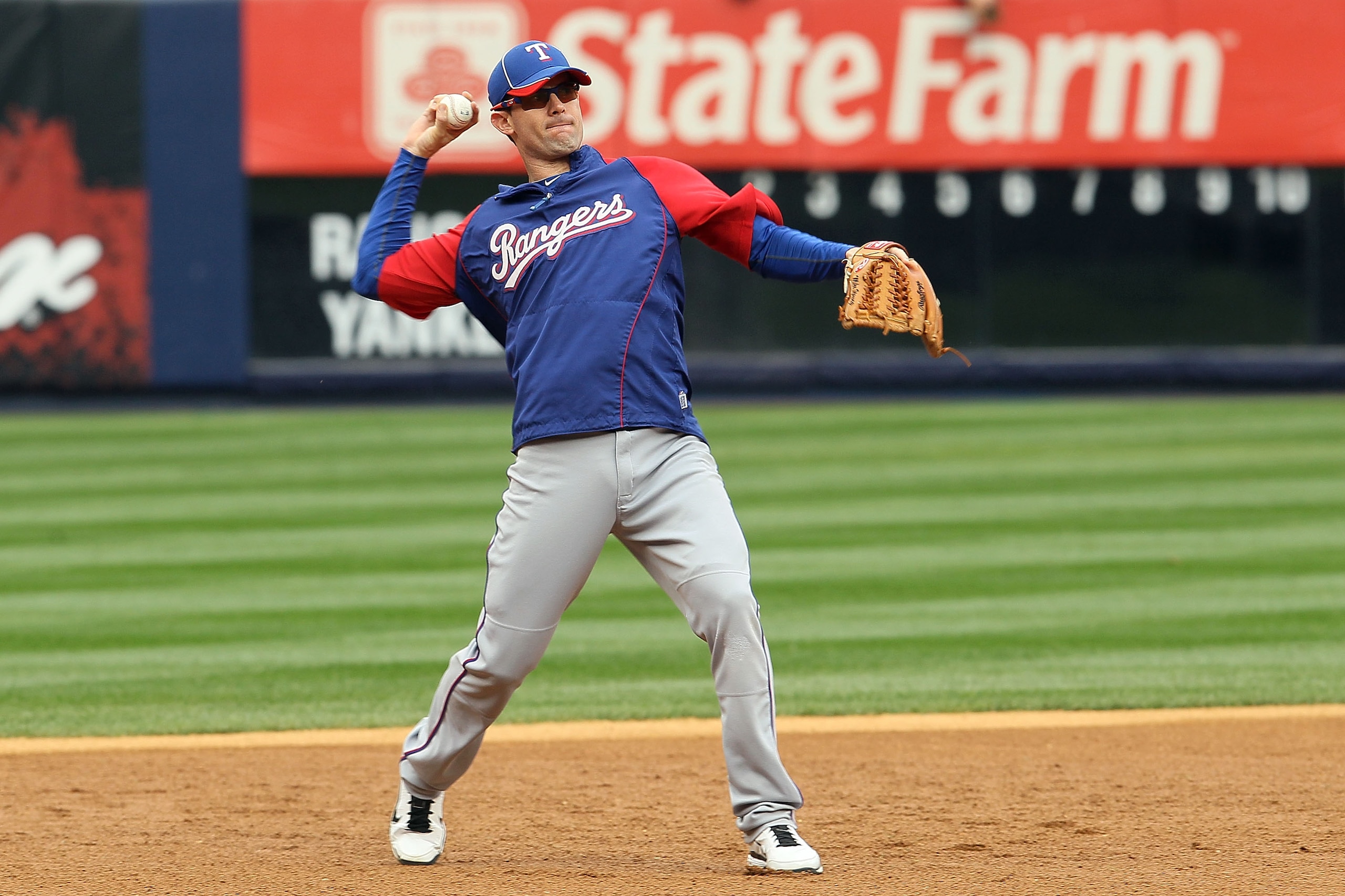 NEW YORK - OCTOBER 20: Michael Young #10 of the Texas Rangers warms up during batting practice against the New York Yankees in Game Five of the ALCS during the 2010 MLB Playoffs at Yankee Stadium on October 20, 2010 in the Bronx borough of New York City NEW YORK - OCTOBER 20: Michael Young #10 of the Texas Rangers warms up during batting practice against the New York Yankees in Game Five of the ALCS during the 2010 MLB Playoffs at Yankee Stadium on October 20, 2010 in the Bronx borough of New York City