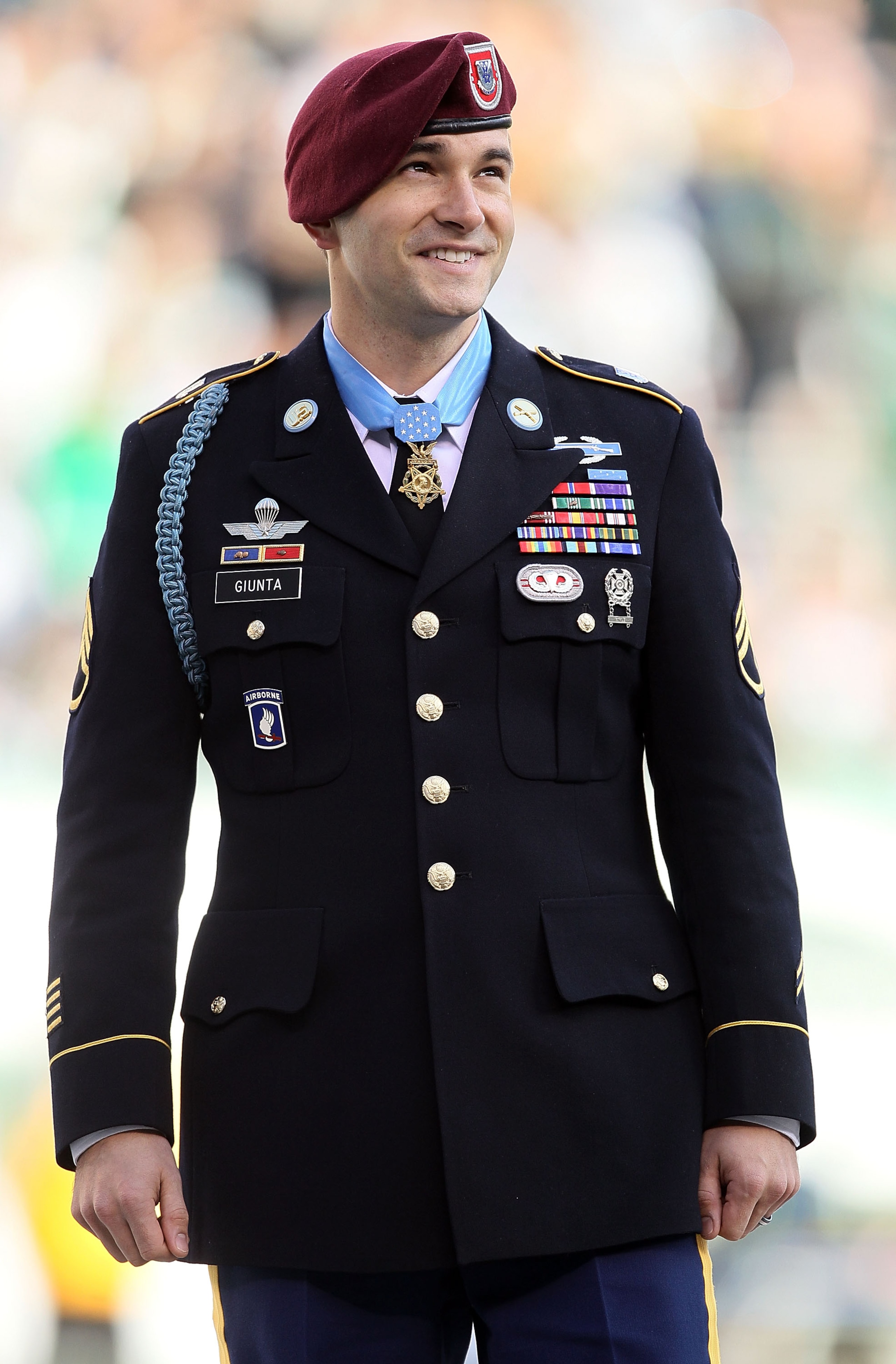 EAST RUTHERFORD, NJ - NOVEMBER 21:  Staff Sgt. Salvatore Giunta, the first living Medal of Honor recipient from the wars in Afghanistan and Iraq, looks on as he is honored during the game between the New York Jets and the Houston Texans on November 21, 20