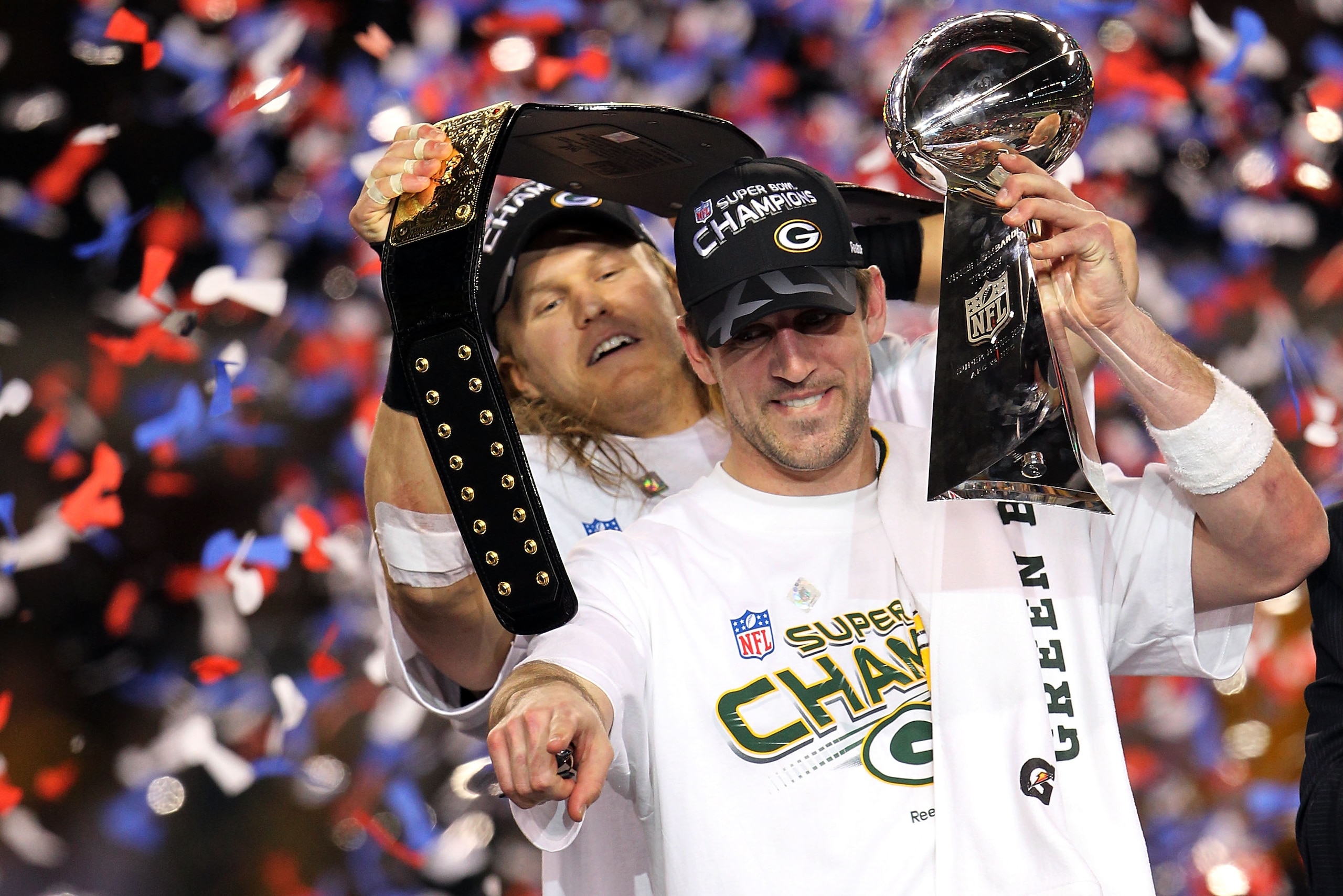 ARLINGTON, TX - FEBRUARY 06: Aaron Rodgers #12 and Clay Matthews #52 of the Green Bay Packers of the Green Bay Packers holds the Lombardi Trophy after defeating the Pittsburgh Steelers 31-25 during Super Bowl XLV at Cowboys Stadium on February 6, 2011 in ARLINGTON, TX - FEBRUARY 06: Aaron Rodgers #12 and Clay Matthews #52 of the Green Bay Packers of the Green Bay Packers holds the Lombardi Trophy after defeating the Pittsburgh Steelers 31-25 during Super Bowl XLV at Cowboys Stadium on February 6, 2011 in