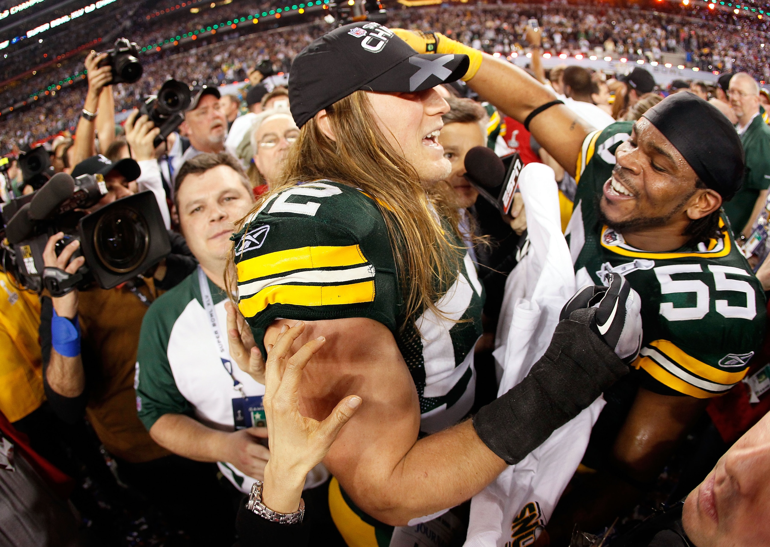 ARLINGTON, TX - FEBRUARY 06: Clay Matthews #52 and Desmond Bishop #55 of the Green Bay Packers celebrate after winning Super Bowl XLV 31-25 against the Pittsburgh Steelers at Cowboys Stadium on February 6, 2011 in Arlington, Texas. (Photo by Kevin C. Cox ARLINGTON, TX - FEBRUARY 06: Clay Matthews #52 and Desmond Bishop #55 of the Green Bay Packers celebrate after winning Super Bowl XLV 31-25 against the Pittsburgh Steelers at Cowboys Stadium on February 6, 2011 in Arlington, Texas. (Photo by Kevin C. Cox