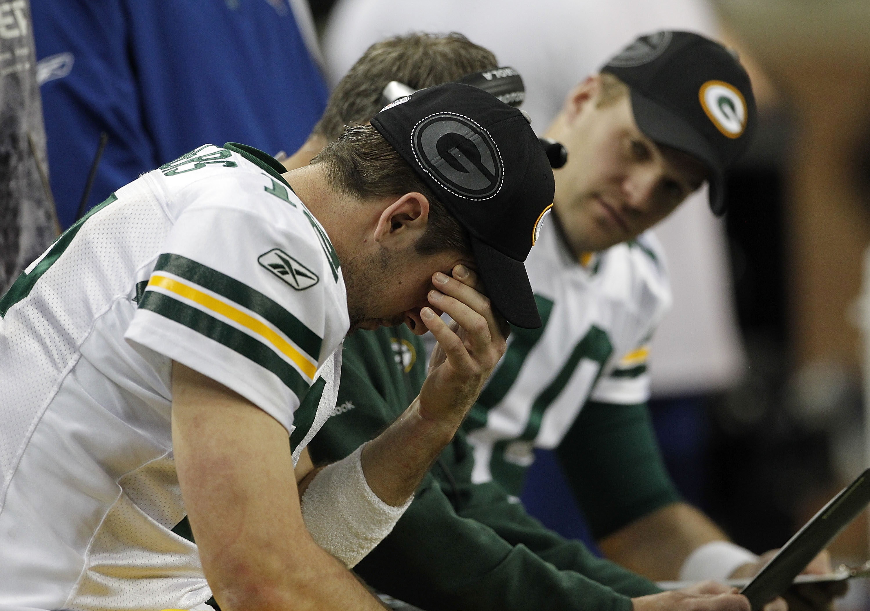 DETROIT - DECEMBER 12:  Aaron Rogers #12 of the Green Bay Packers during the second quarter of the game against the Detroit Lions at Ford Field on December 12, 2010 in Detroit, Michigan.  (Photo by Leon Halip/Getty Images)