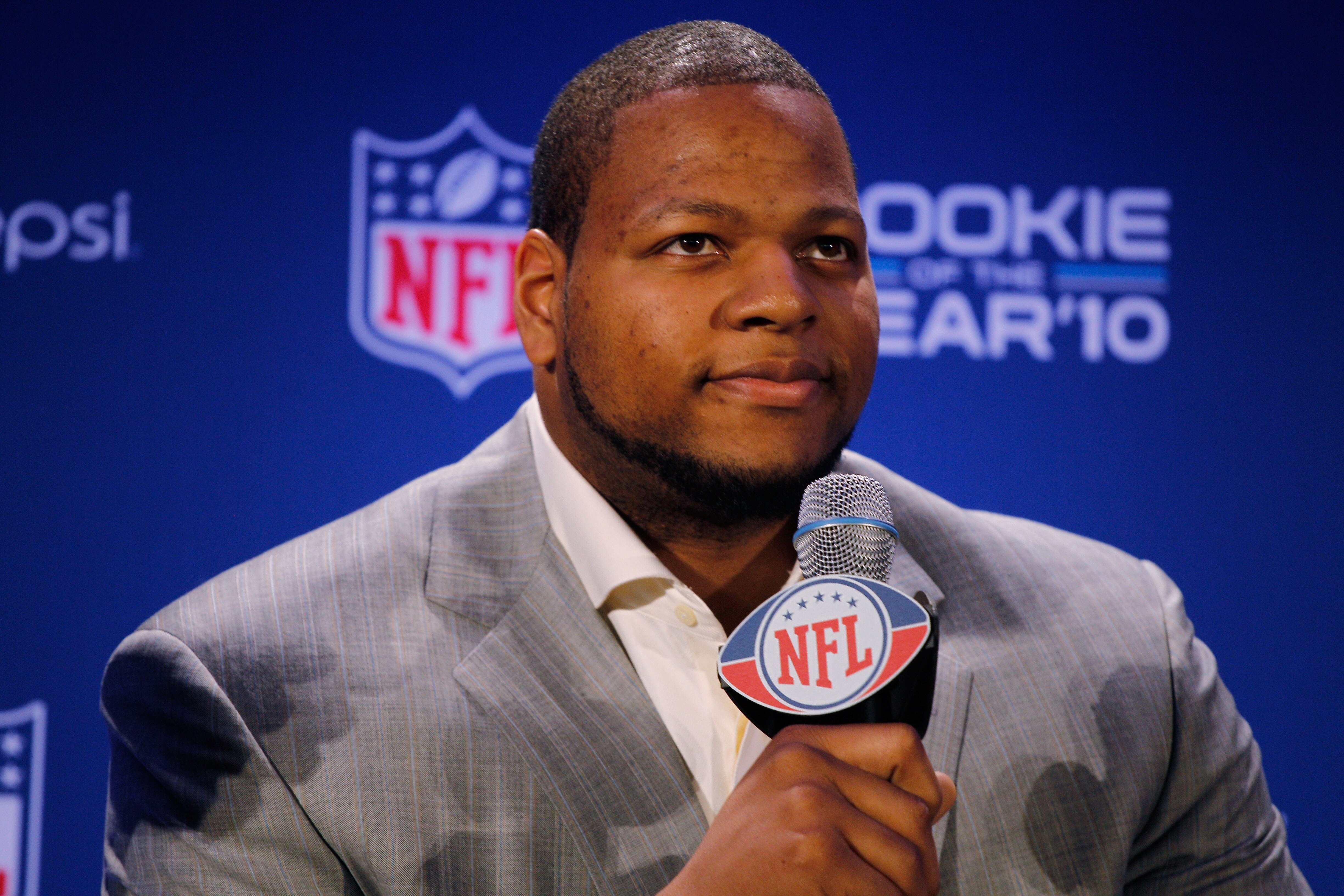 DALLAS, TX - FEBRUARY 03:  Ndamukong Suh #90 of the Detroit Lions speaks during a press conference where he accepted Pepsi's 2010 NFL Rookie of the Year Award at the Super Bowl XLV media center on February 3, 2011 in Dallas, Texas. The Green Bay Packers w