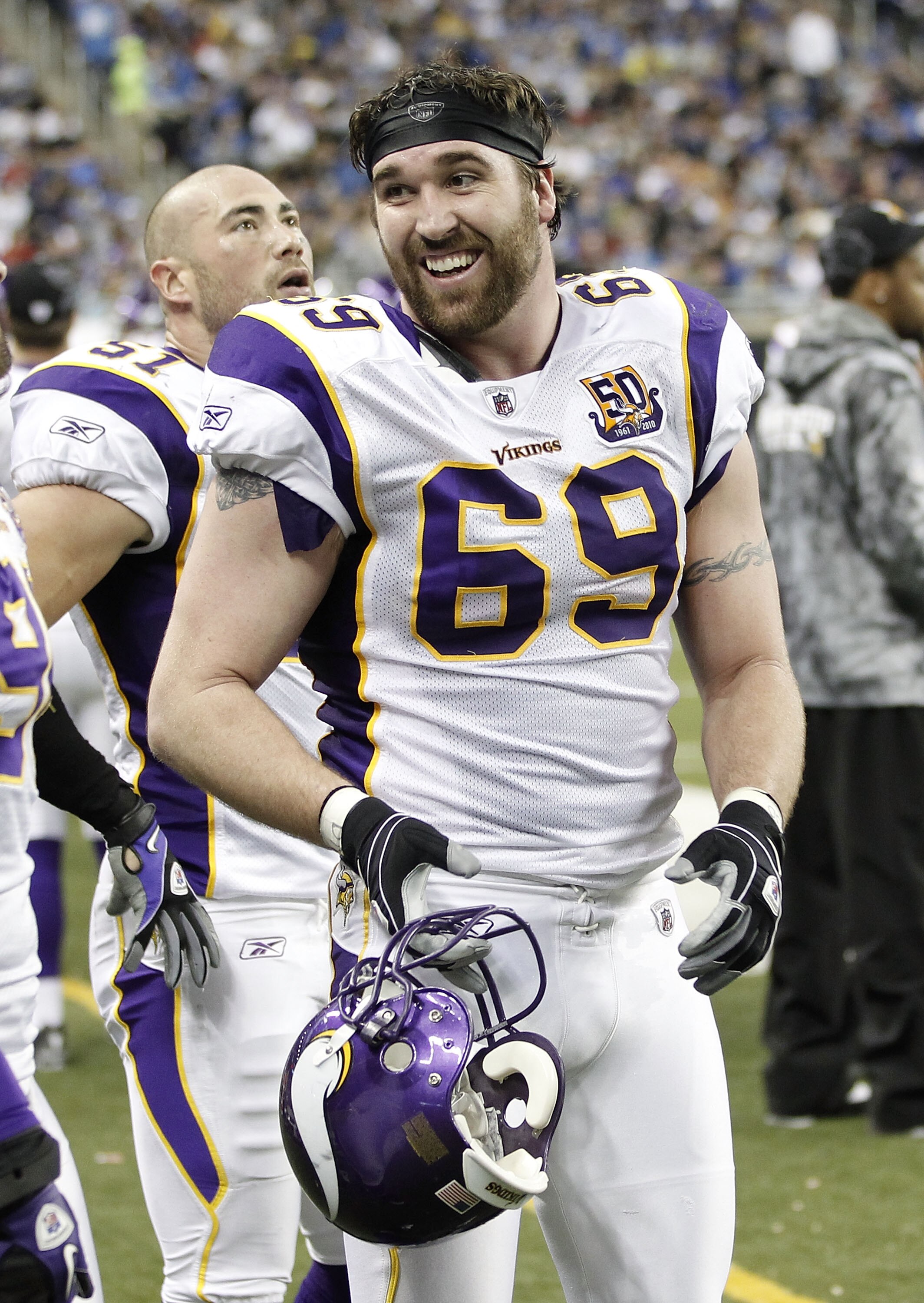 DETROIT, MI - JANUARY 02:  Jared Allen #69 of the Minnesota Vikings smiles on the bench after returning an interception for a touchdown while playing the Detroit Lions at Ford Field on January 2, 2011 in Detroit, Michigan. Detroit won the game 20-13.  (Ph