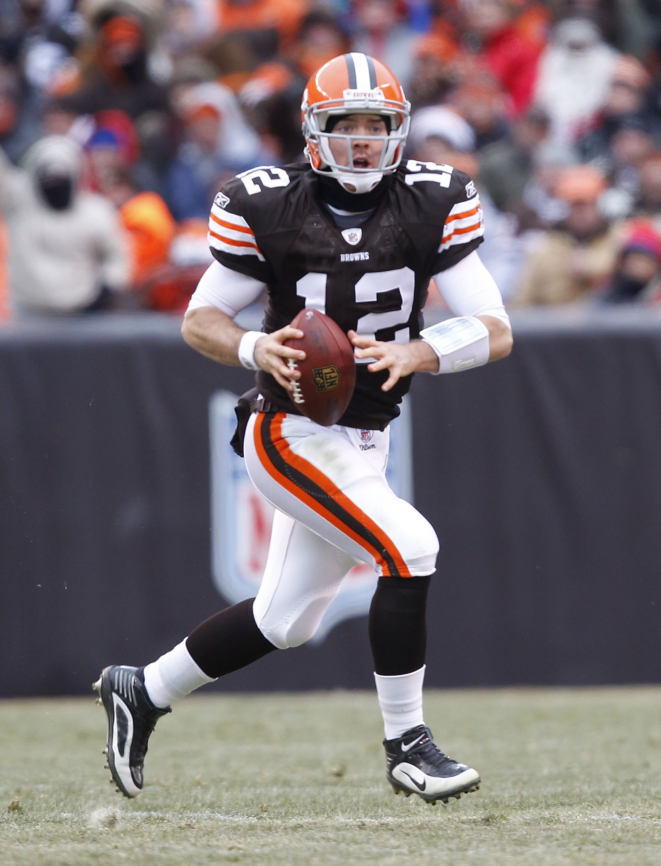 CLEVELAND - DECEMBER 26:  Quarterback Colt McCoy #12 of the Cleveland Browns looks for a receiver against the Baltimore Ravens at Cleveland Browns Stadium on December 26, 2010 in Cleveland, Ohio.  (Photo by Matt Sullivan/Getty Images)