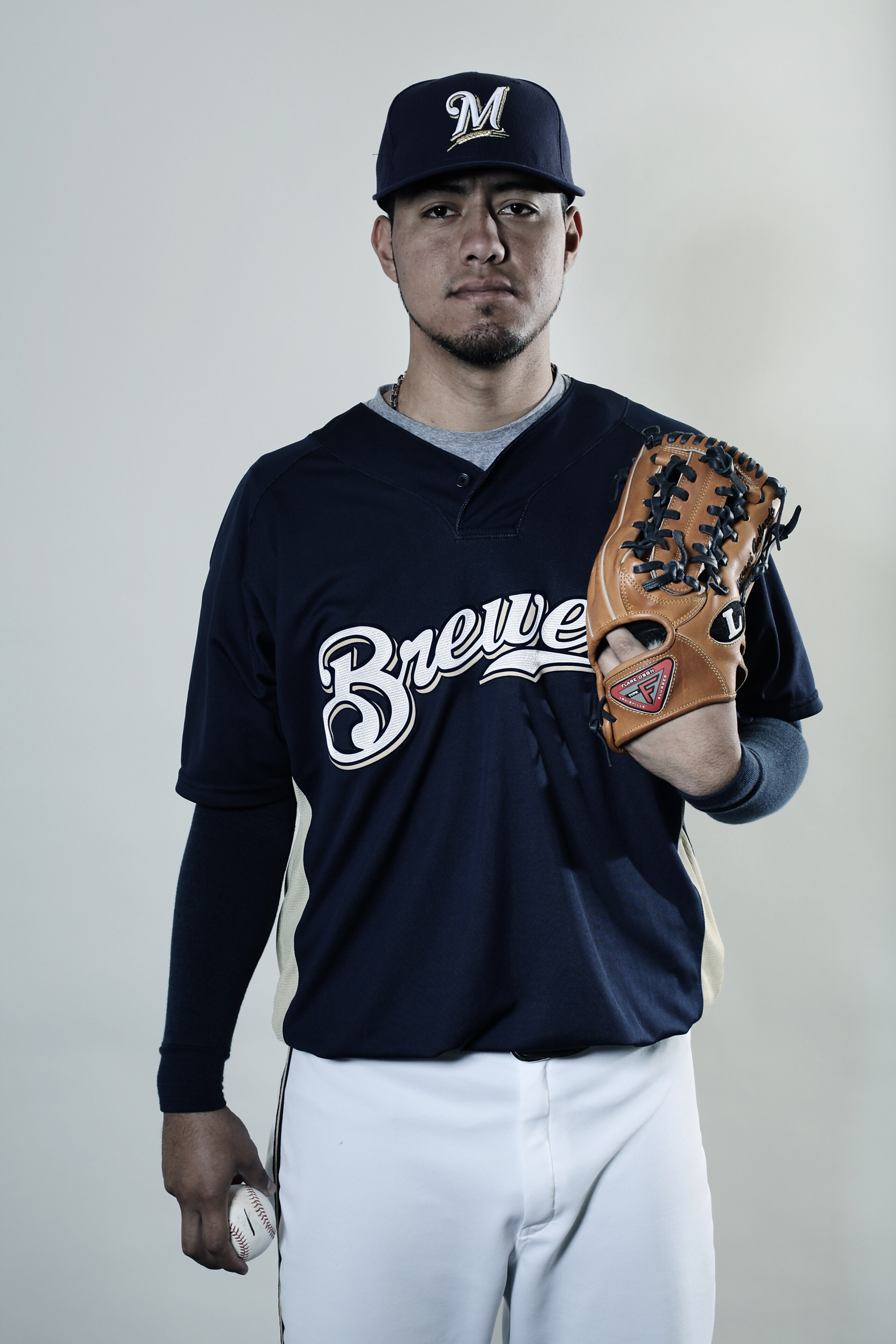 MARYVALE, AZ - MARCH 01: (EDITORS NOTE: THIS IMAGES HAS BEEN DIGITALLY DESATURATED) Yovani Gallardo #49 poses for a portrait during the Milwaukee Brewers Photo Day at the Maryvale Baseball Park on March 1, 2010 in Maryvale, Arizona. (Photo by Jonathan MARYVALE, AZ - MARCH 01: (EDITORS NOTE: THIS IMAGES HAS BEEN DIGITALLY DESATURATED) Yovani Gallardo #49 poses for a portrait during the Milwaukee Brewers Photo Day at the Maryvale Baseball Park on March 1, 2010 in Maryvale, Arizona. (Photo by Jonathan