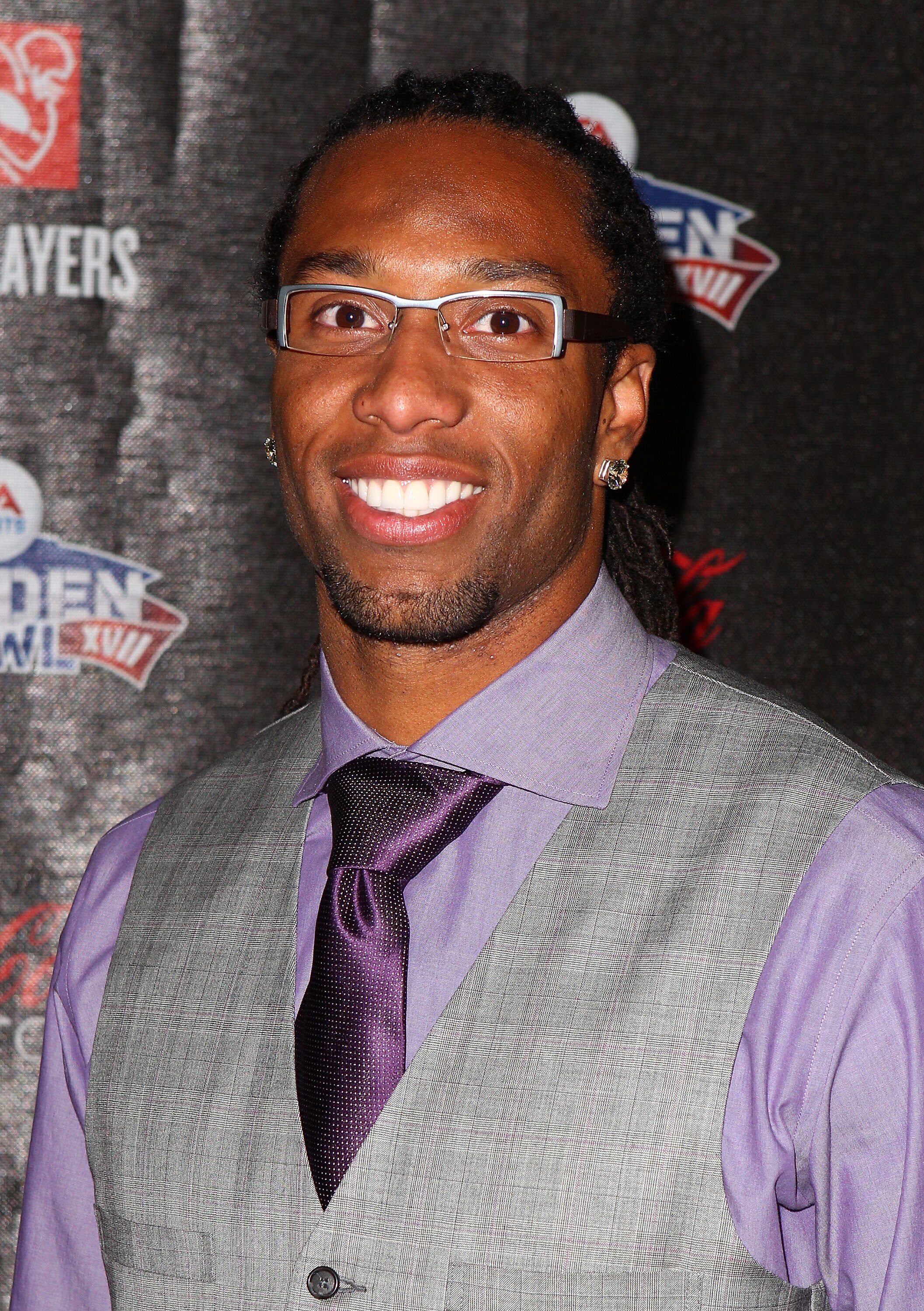 GRAPEVINE, TX - FEBRUARY 03: NFL player Larry Fitzgerald of the Arizona Cardinals attends the Coke Zero black carpet at the EA SPORTS Madden Bowl XVII at The Glass Cactus on February 3, 2011 in Grapevine, Texas.  (Photo by Joe Scarnici/Getty Images for Ma