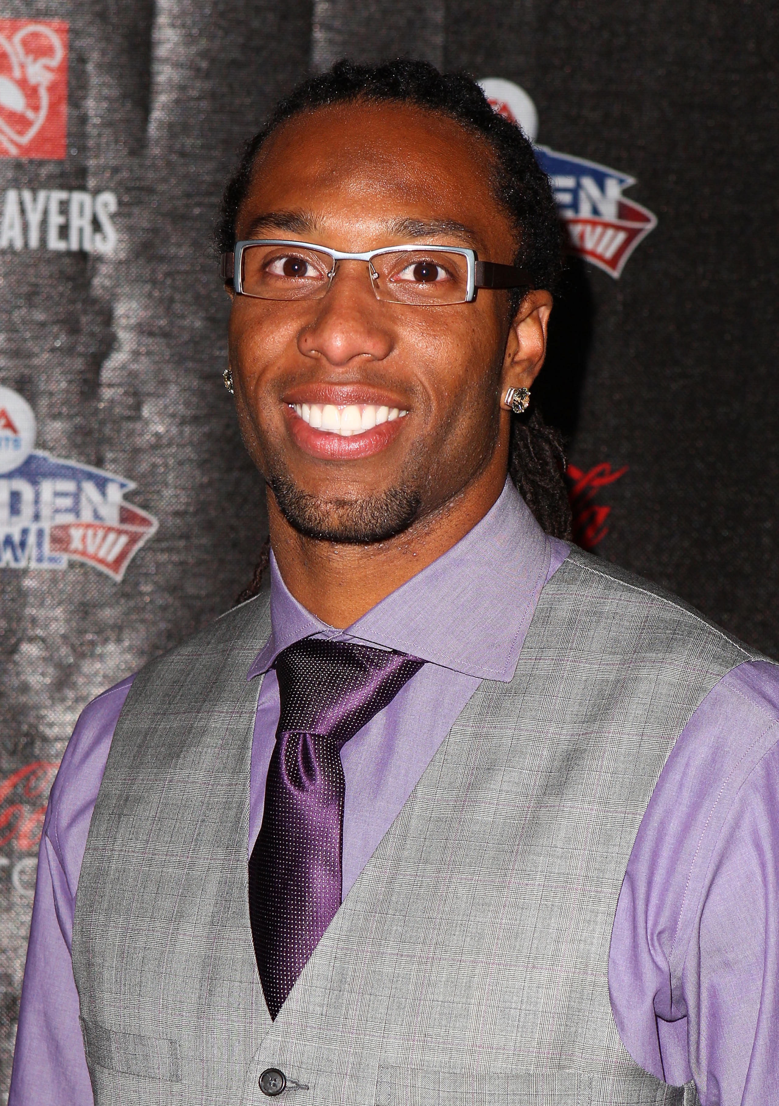 GRAPEVINE, TX - FEBRUARY 03: NFL player Larry Fitzgerald of the Arizona Cardinals attends the Coke Zero black carpet at the EA SPORTS Madden Bowl XVII at The Glass Cactus on February 3, 2011 in Grapevine, Texas.  (Photo by Joe Scarnici/Getty Images for Ma