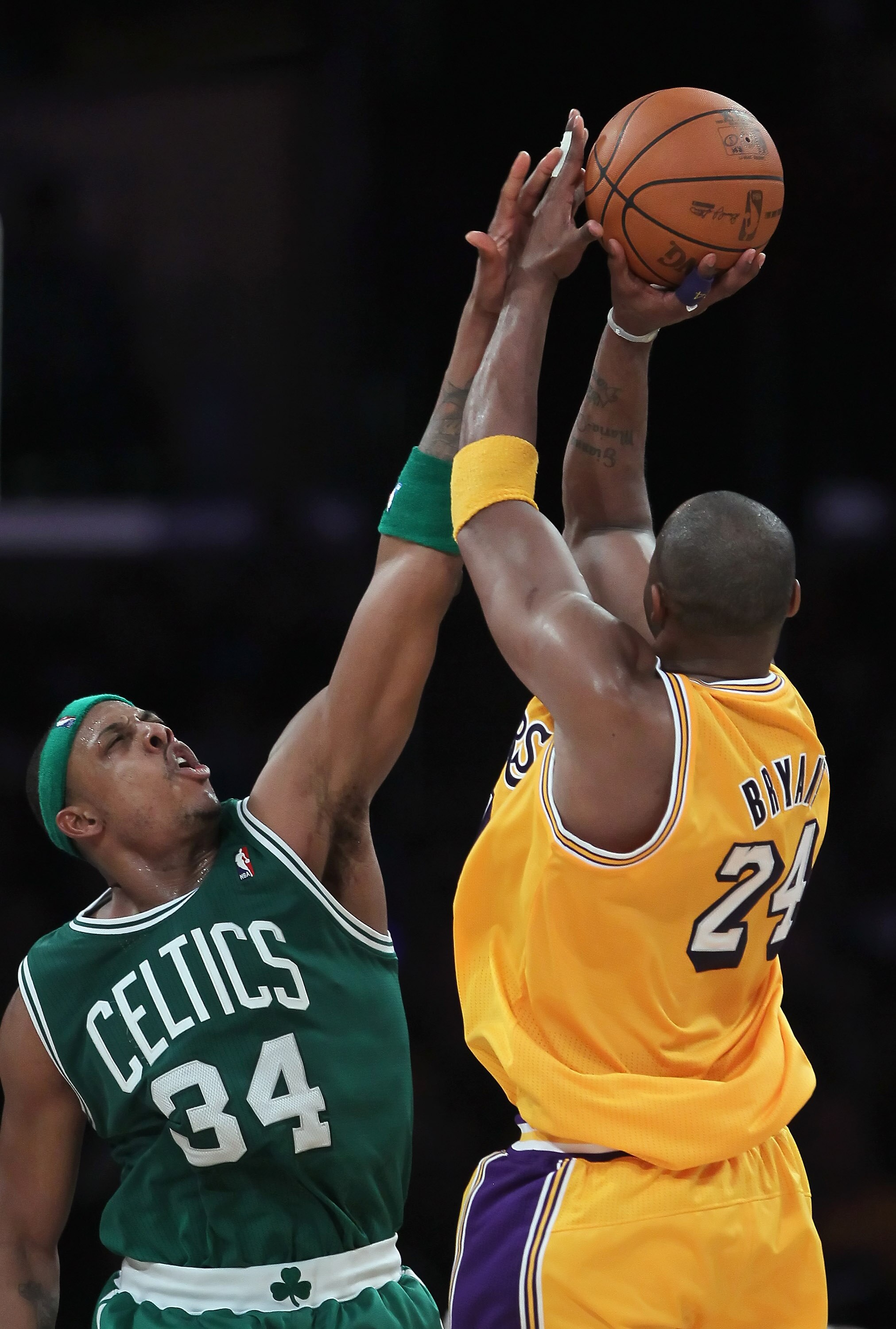 LOS ANGELES, CA - JANUARY 30:  Kobe Bryant #24  of the Los Angeles Lakers is defended by Paul Pierce #34 of the Boston Celtics in the second half at Staples Center on January 30, 2011 in Los Angeles, California. The Celtics defeated the Lakers 109-96.  (P
