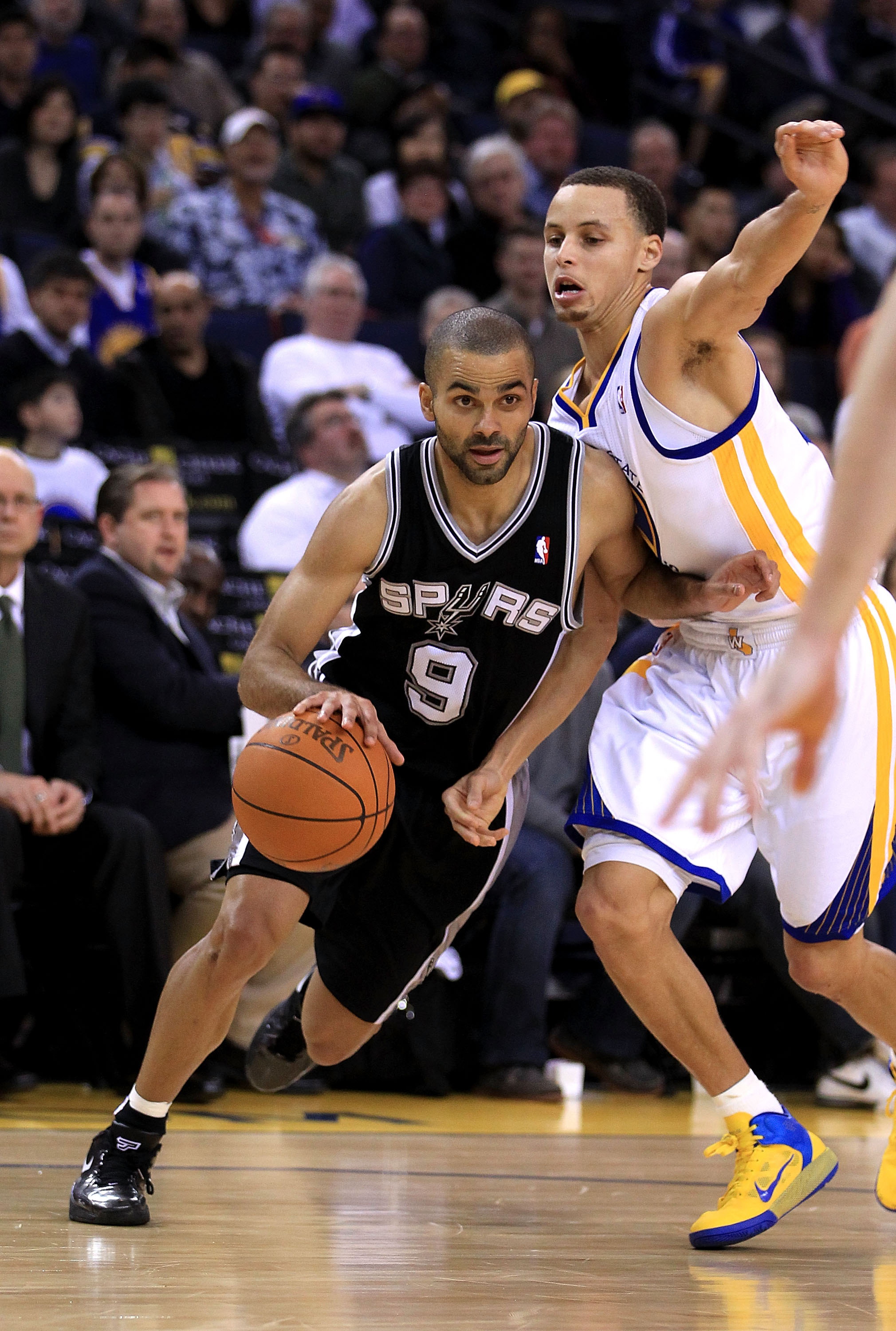 OAKLAND, CA - JANUARY 24:  Tony Parker #9 of the San Antonio Spurs in action against the Golden State Warriors at Oracle Arena on January 24, 2011 in Oakland, California.  NOTE TO USER: User expressly acknowledges and agrees that, by downloading and or us