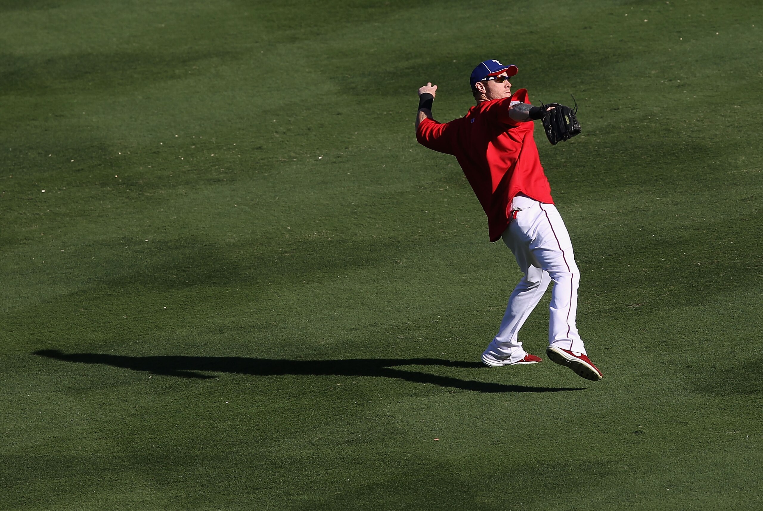 ARLINGTON, TX - NOVEMBER 01:  Josh Hamilton #32 of the Texas Rangers warms up before Game Five against the San Francisco Giants of the 2010 MLB World Series at Rangers Ballpark on November 1, 2010 in Arlington, Texas.  The Giants defeated the Rangers 3-1