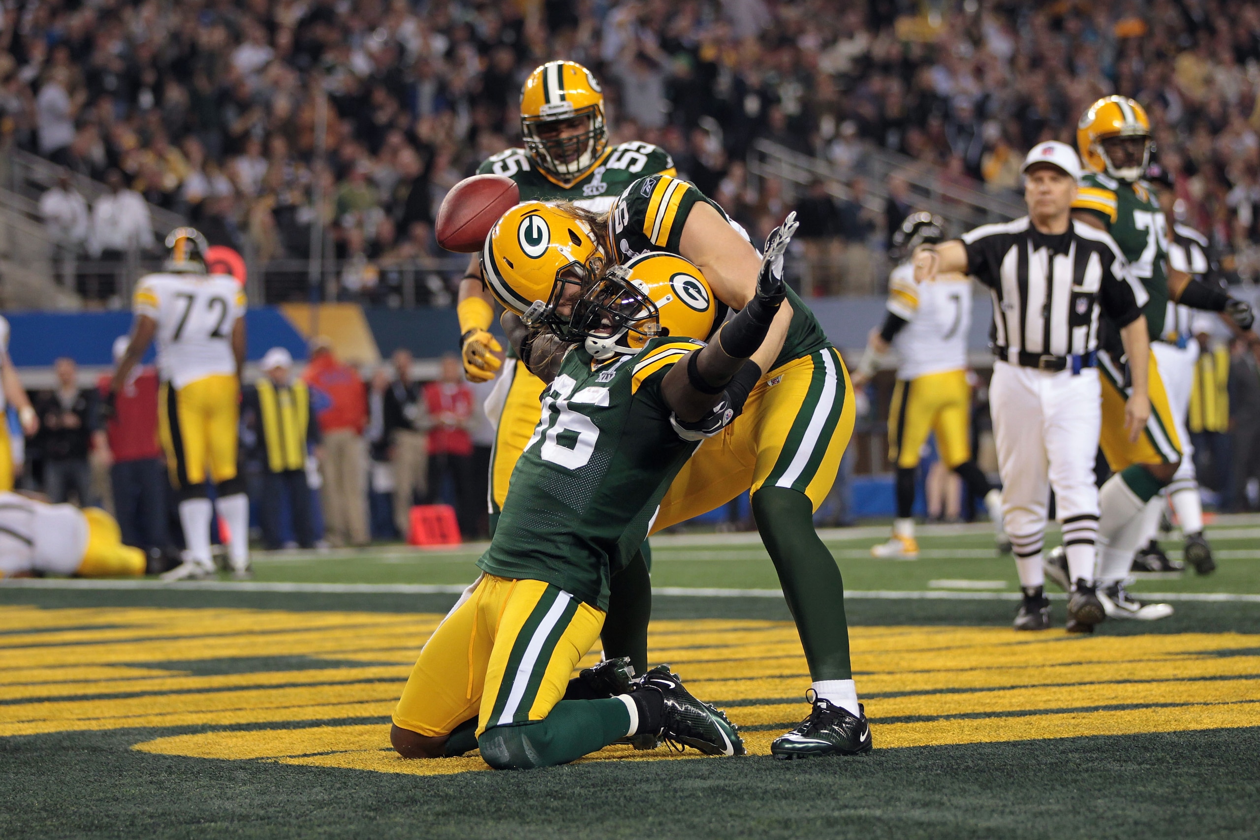 ARLINGTON, TX - FEBRUARY 06:  Nick Collins #36 of the Green Bay Packers celebrates with Clay Matthews #52 against the Pittsburgh Steelers during Super Bowl XLV at Cowboys Stadium on February 6, 2011 in Arlington, Texas.  (Photo by Jamie Squire/Getty Image