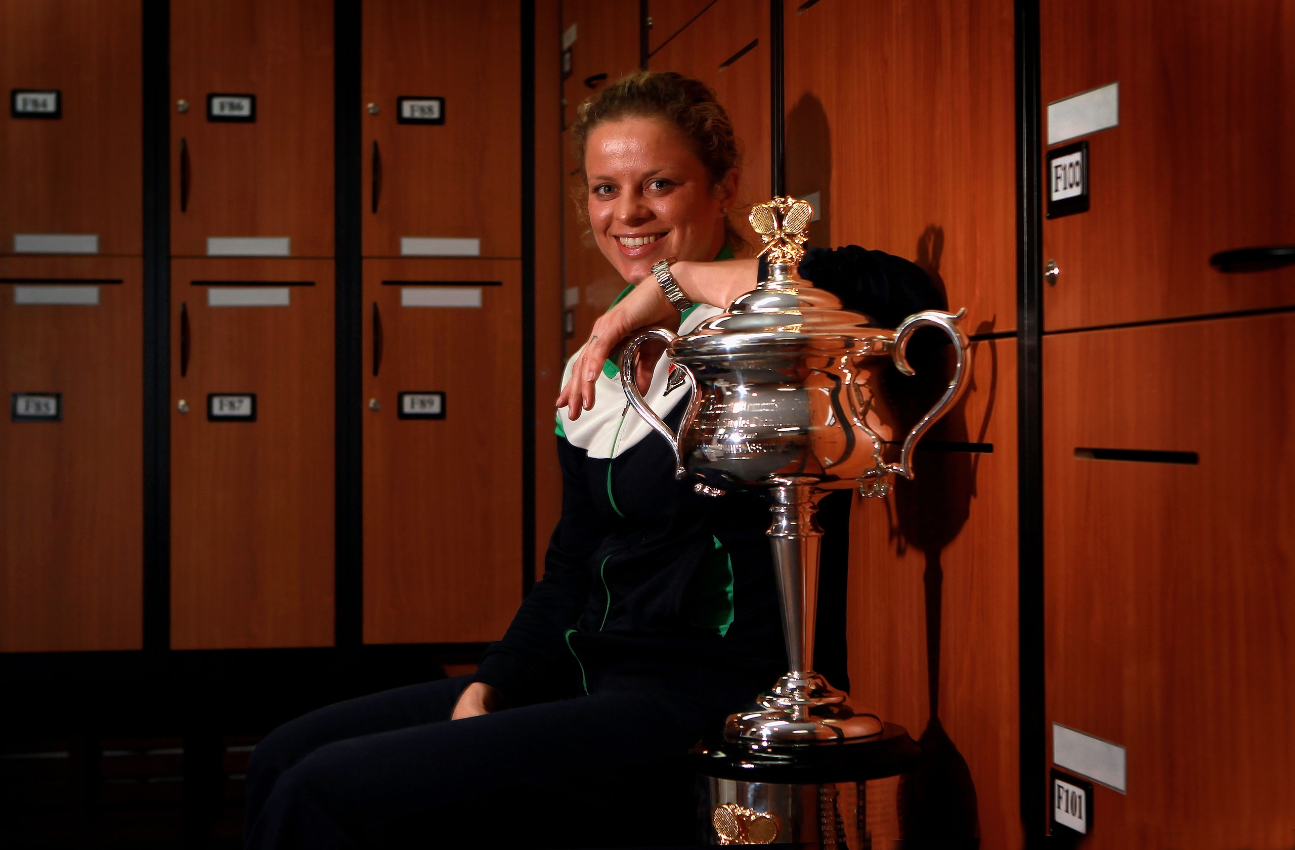 MELBOURNE, AUSTRALIA - JANUARY 29:  Kim Clijsters of Belgium poses with the Daphne Akhurst Trophy in the changing room after winning her women's final match against Na Li of China during day thirteen of the 2011 Australian Open at Melbourne Park  on Janua