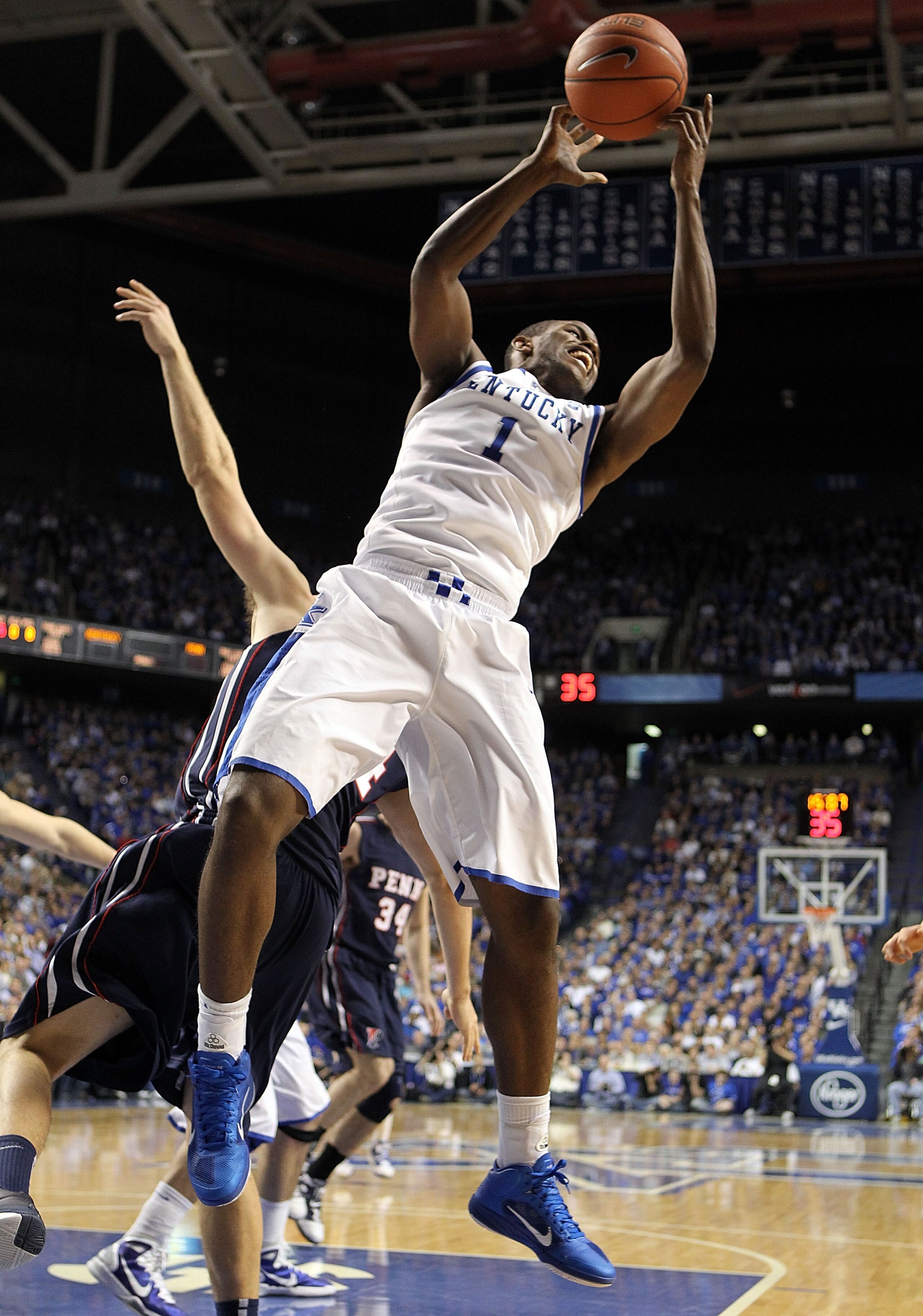 LEXINGTON, KY - JANUARY 03: Darius Miller #1 of the Kentucky Wildcats grabs a rebound during the game against the Penn Quakers at Rupp Arena on January 3, 2011 in Lexington, Kentucky. Kentucky won 86-62. (Photo by Andy Lyons/Getty Images) LEXINGTON, KY - JANUARY 03: Darius Miller #1 of the Kentucky Wildcats grabs a rebound during the game against the Penn Quakers at Rupp Arena on January 3, 2011 in Lexington, Kentucky. Kentucky won 86-62. (Photo by Andy Lyons/Getty Images)