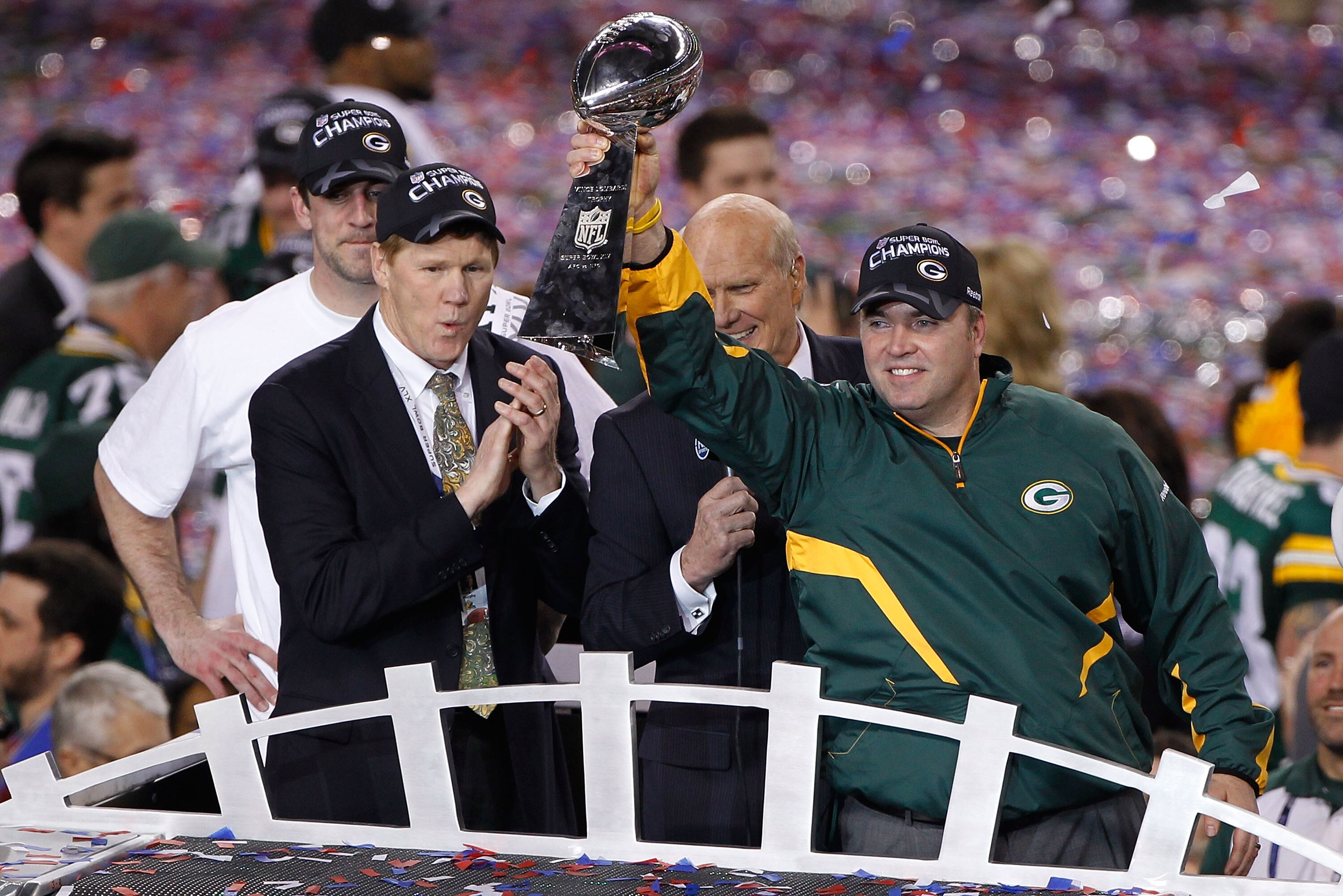 ARLINGTON, TX - FEBRUARY 06:  Head coach Mike McCarthy of the Green Bay Packers holds up The Vince Lombardi Trophy after the Green Bay Packers defeated the Pittsburgh Steelers 31 to 25 in Super Bowl XLV at Cowboys Stadium on February 6, 2011 in Arlington,