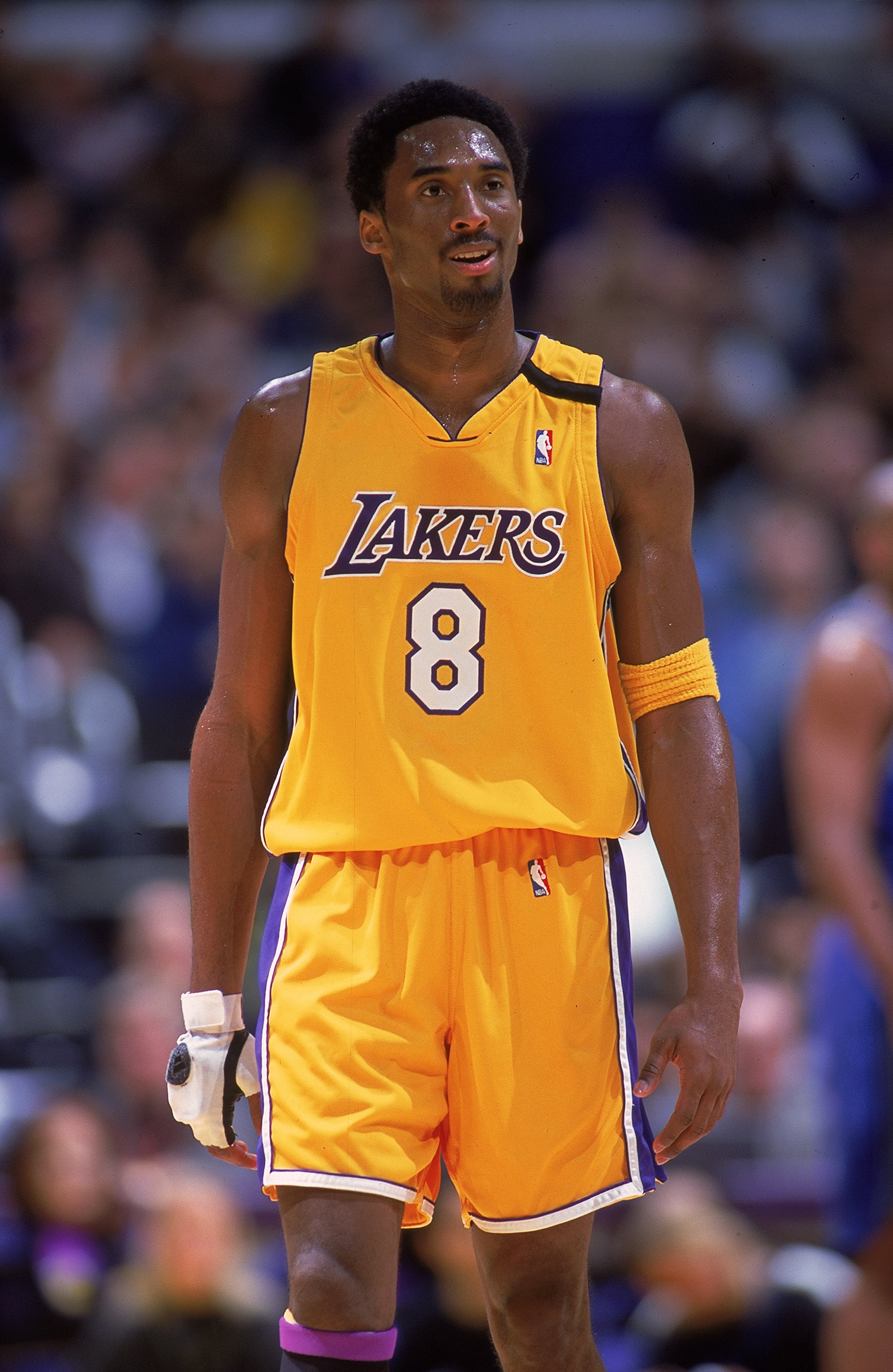5 Dec 1999:  Kobe Bryant #8 of the Los Angeles Lakers looks on from the court during the game against the Orlando Magic at the Staples Center in Los Angeles, California. The Lakers defeated the Magic 117-100.   Mandatory Credit: Donald Miralle  /Allsport