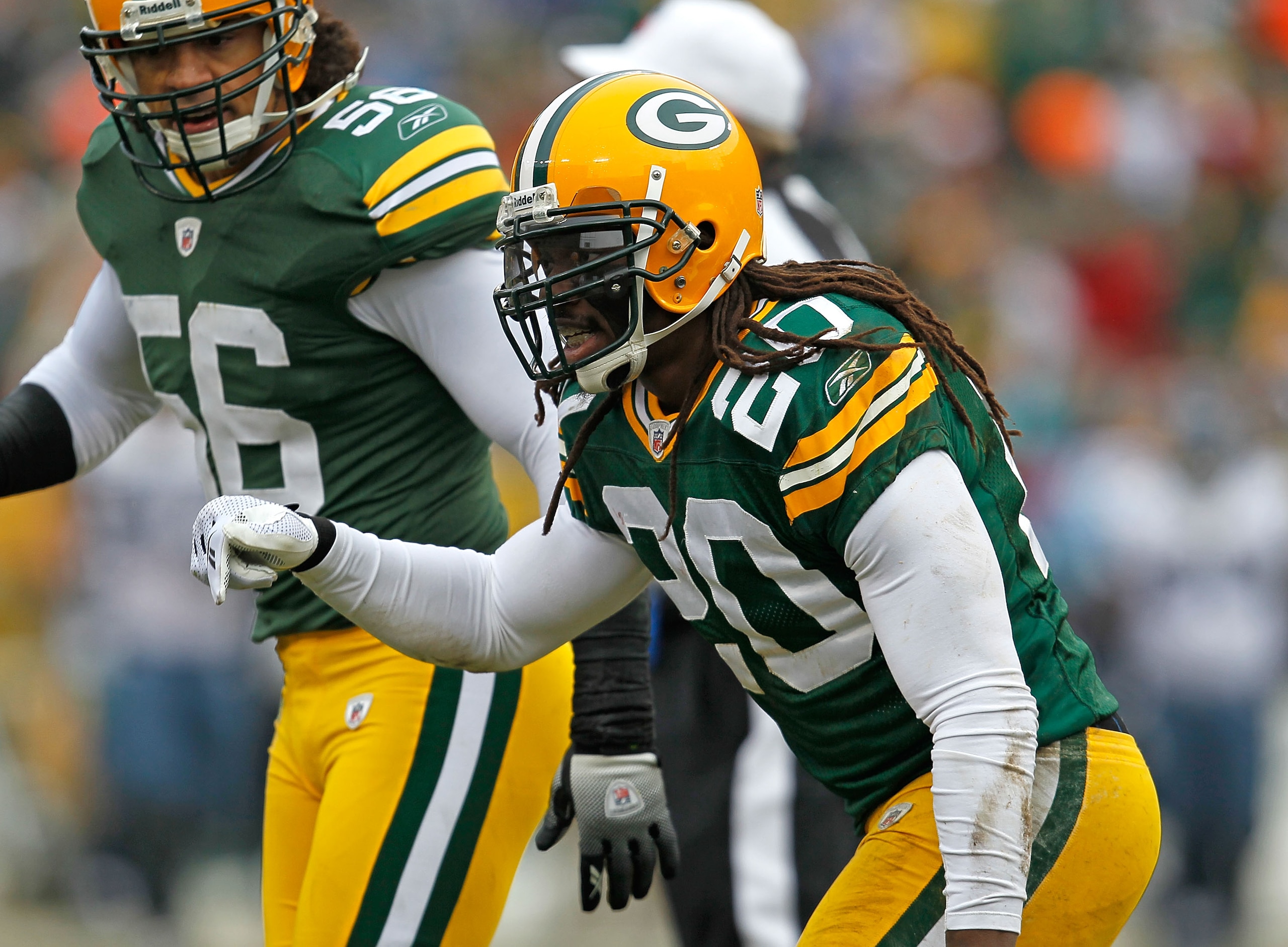GREEN BAY, WI - DECEMBER 27: Atari Bigby #20 of the Green Bay Packers celebrates one of his two interceptions against the Seattle Seahawks at Lambeau Field on December 27, 2009 in Green Bay, Wisconsin. The Packers defeated the Seahawks 48-10. (Photo by Jo