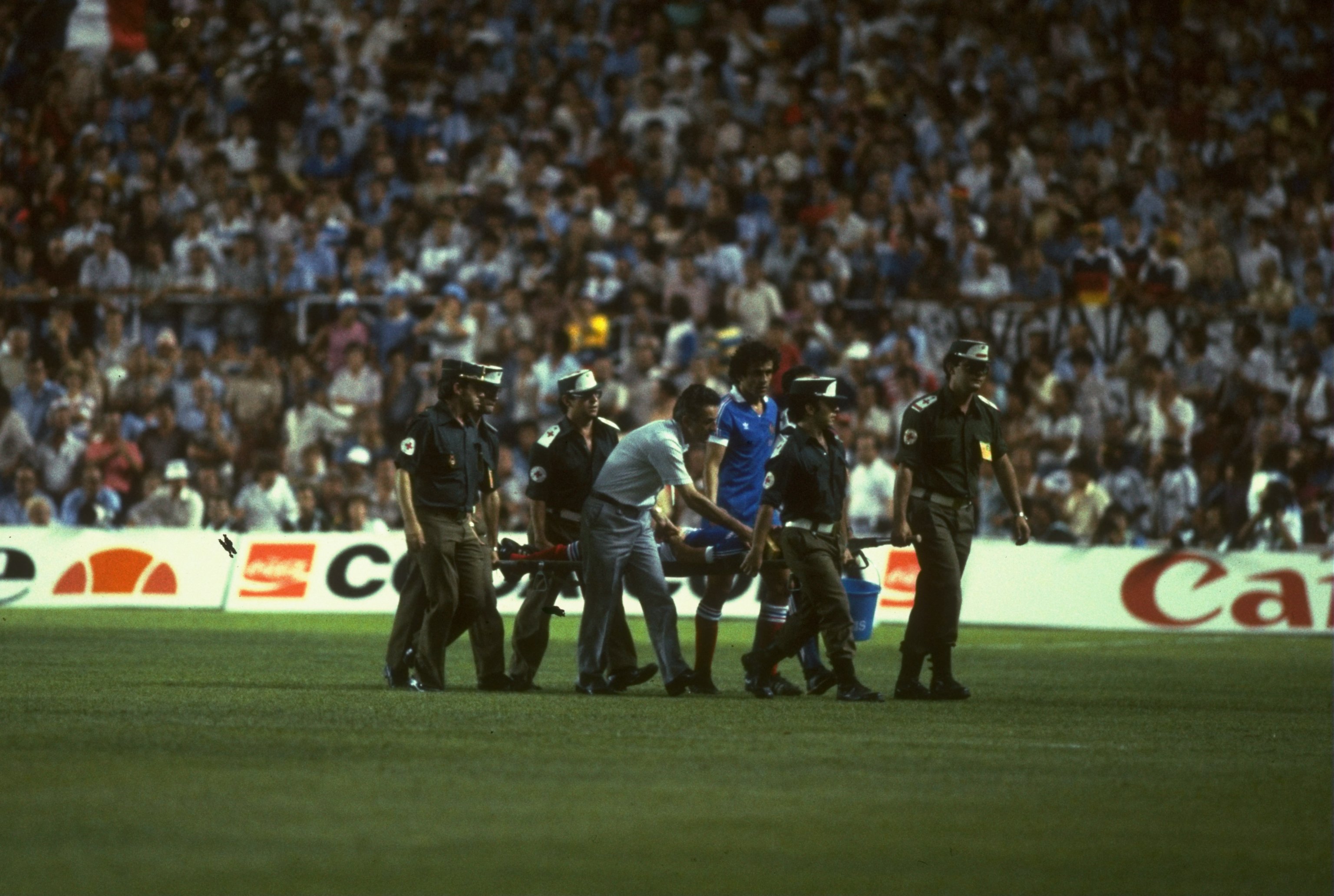 8 Jul 1982:  Battiston of France is stretchered off after a tackle by Harald Schumacher of West Germany during the 1982 World Cup semi-final match at Sanchez Pizjuan in Seville, Spain. The match ended in a 3-3 draw.  \ Mandatory Credit: Steve  Powell/Alls
